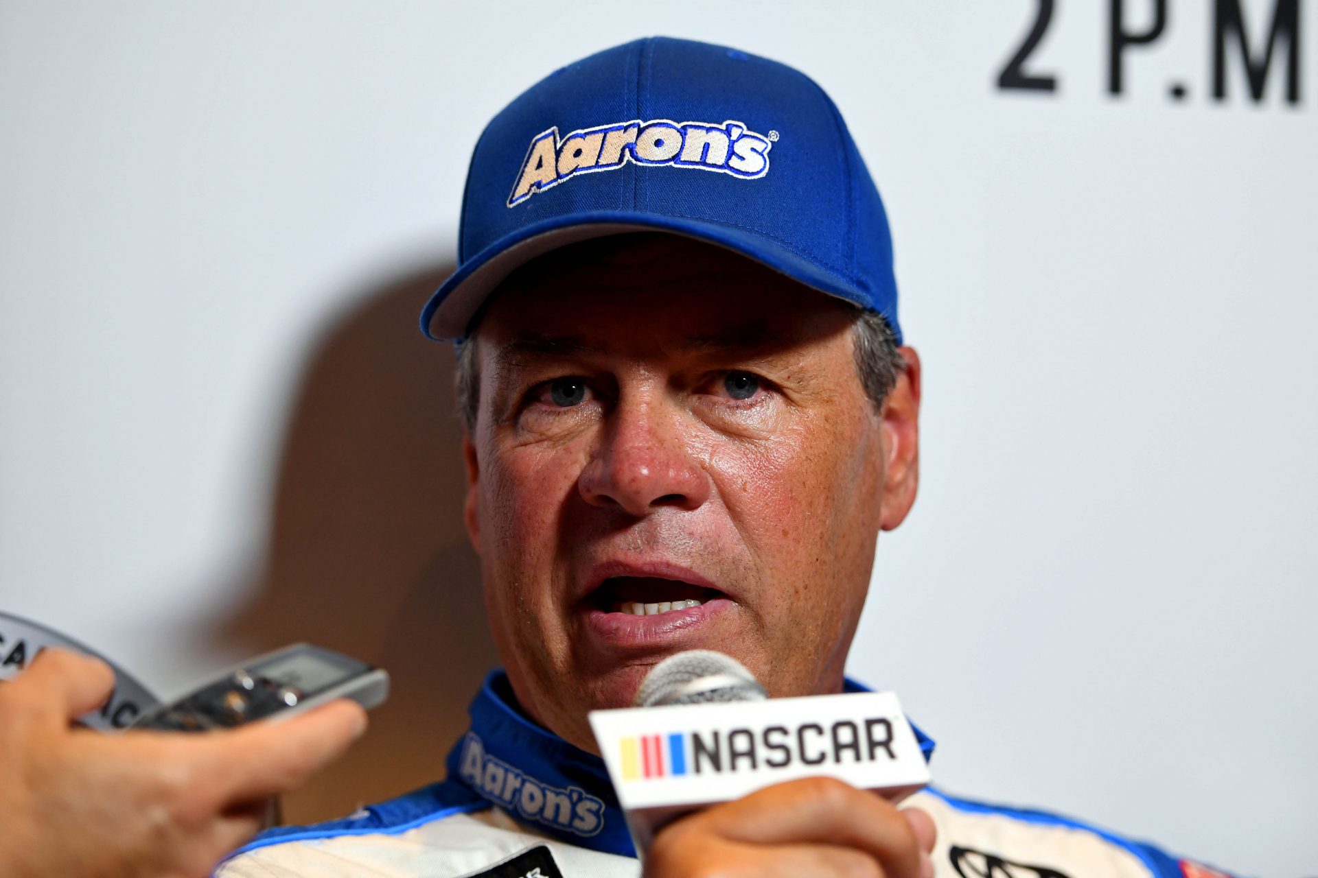 NASCAR Cup series driver Michael Waltrip speaks to the media during Daytona 500 media day at Daytona International Speedway.
