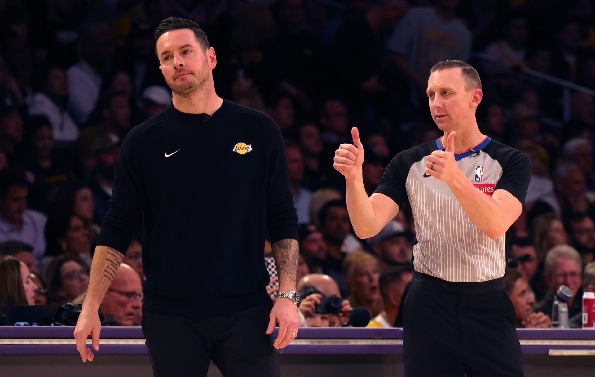 Los Angeles Lakers head coach JJ Redick reacts to a call by NBA referee Justin Van Duyne (64) during the fourth quarter against the LA Clippers at Crypto.com Arena.