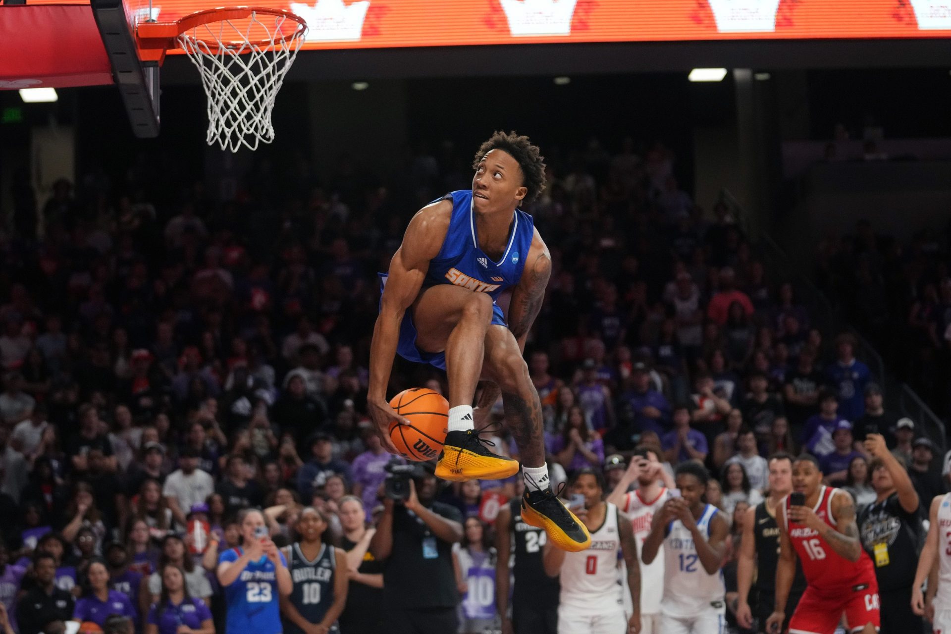 UC Santa Barbara's Josh Pierre-Louis competes in the dunk contest during the 2024 State Farm College Slam Dunk & 3-Point Championships at GCU in Phoenix on April 4, 2024.