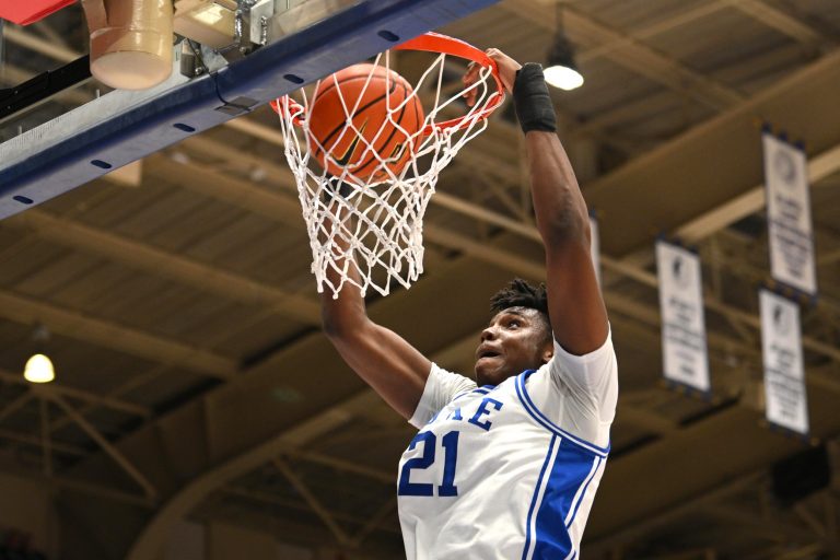 Duke Blue Devils center Patrick Ngongba II (21) dunks the ball gainst the Syracuse Orange -
Source: Imagn