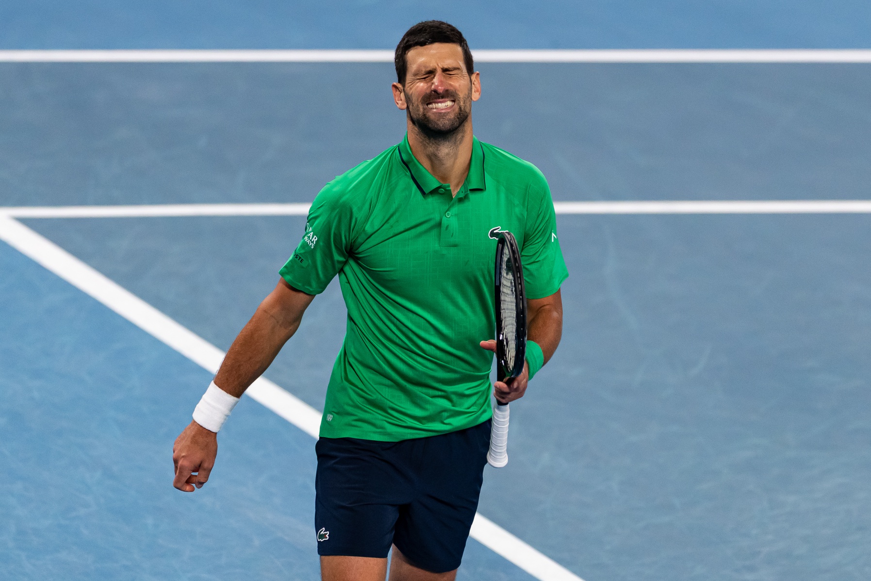 Novak Djokovic of Serbia in action against Carlos Alcaraz of Spain in the final of the mens singles at the Australian Open at Rod Laver Arena in Melbourne Park.