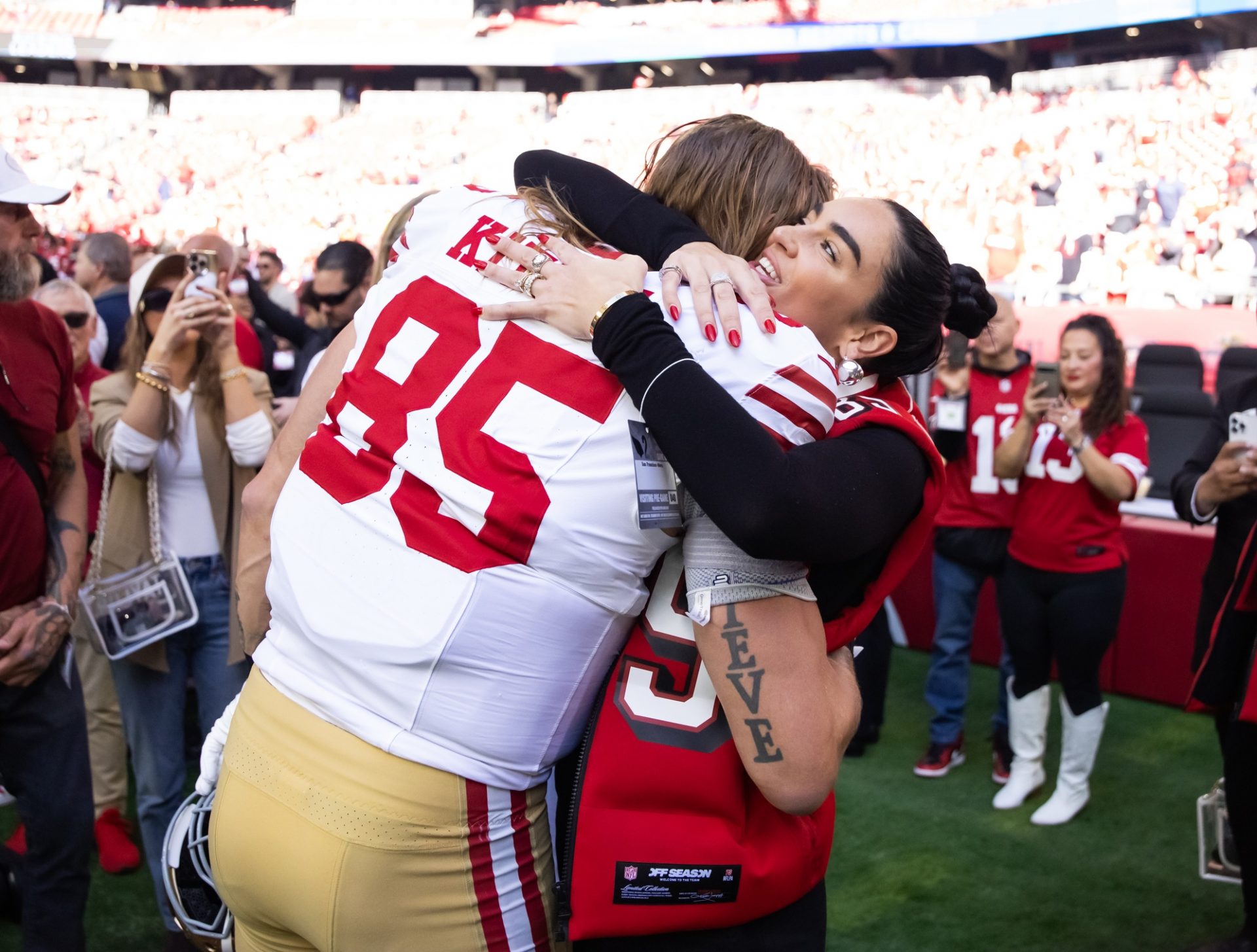 Claire and George Kittle - Source: Imagn