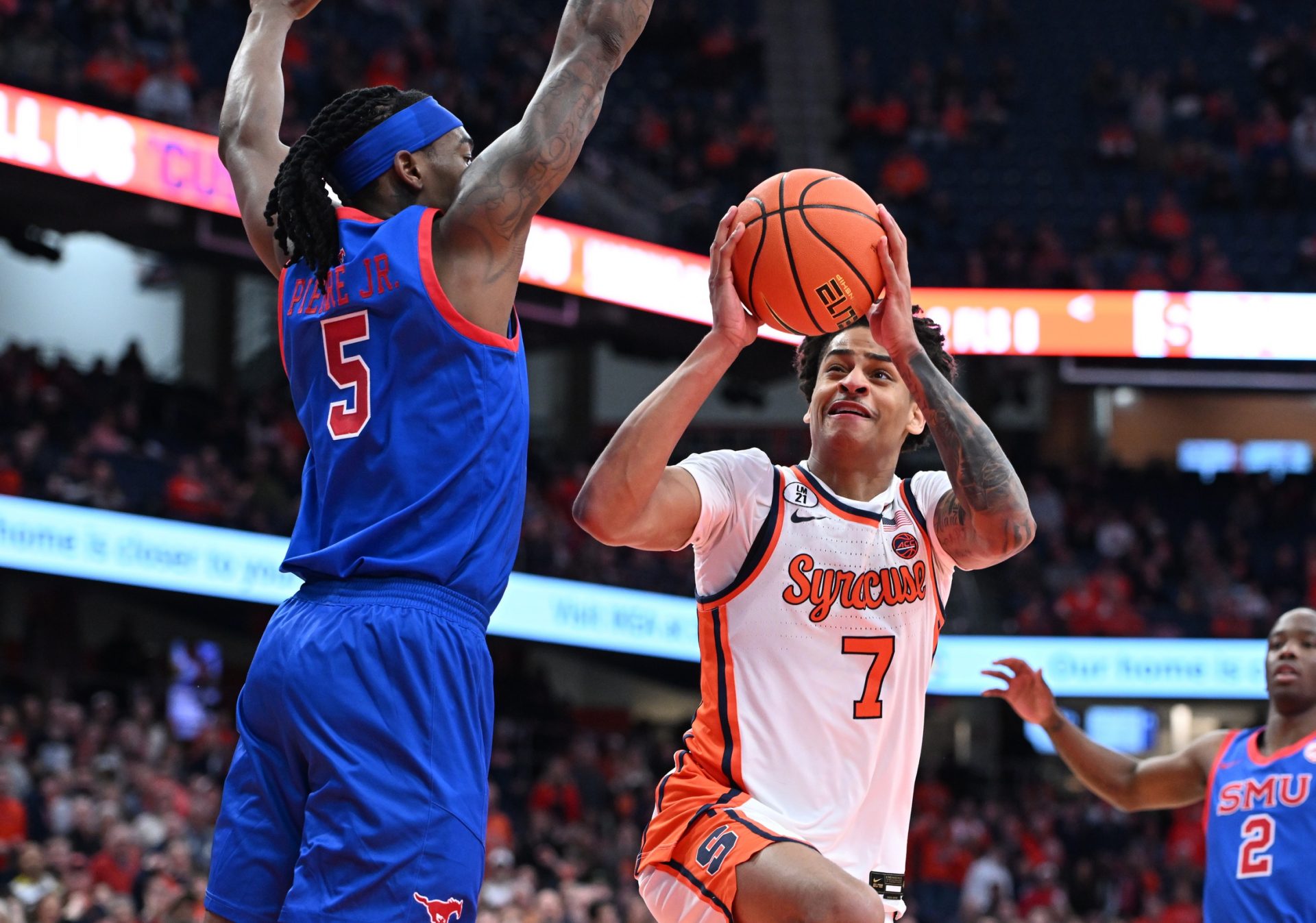 Syracuse Orange forward Kiyan Anthony (7) shoots the ball with Southern Methodist University Mustangs guard Jaron Pierre Jr.
Source: Imagn