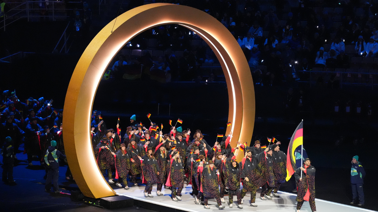 Athletes from Germany are led by flag bearer Leon Draisaitl during the Opening Ceremony for the Milano Cortina 2026 Olympic Winter Games at Milano San Siro Olympic Stadium.