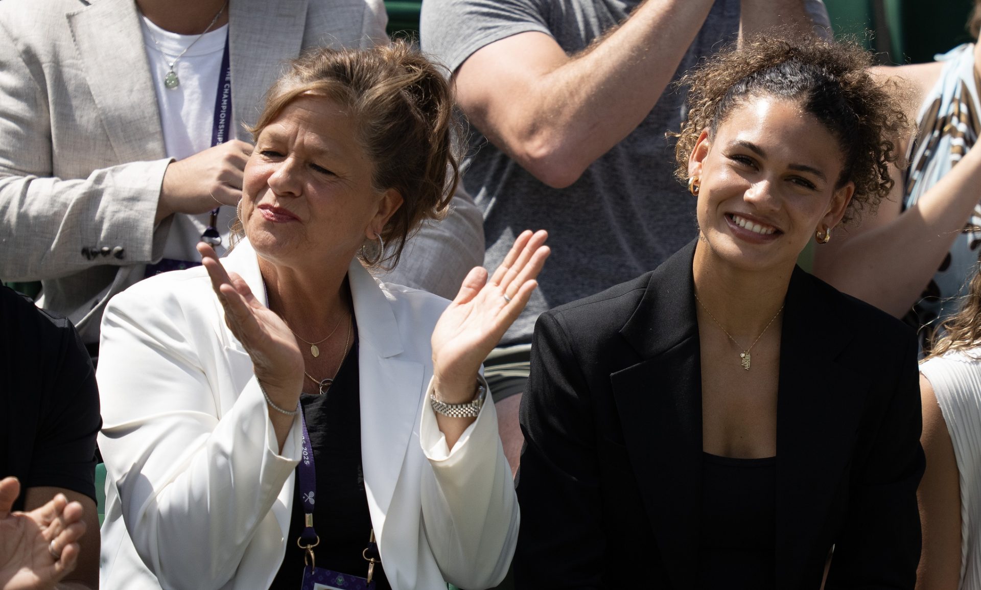 Lisa Shelton and Trinity Rodman in attendance for the Ben Shelton of the United States and Rinky Hijikata of Australia (both not shown) match completion on day five at the All England Lawn Tennis and Croquet Club.
