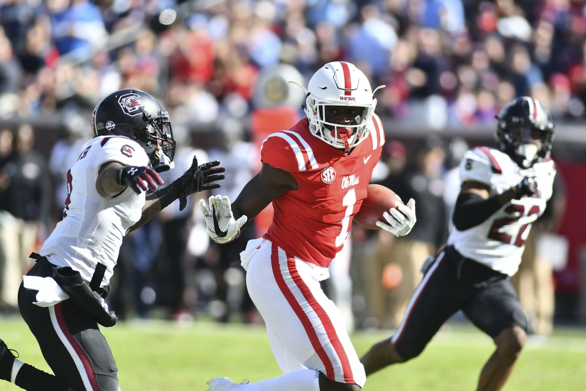 Mississippi Rebels wide receiver A.J. Brown (1) carries the ball as he is defended by South Carolina Gamecocks defensive back Keisean Nixon (9) during the second quarter at Vaught-Hemingway Stadium.