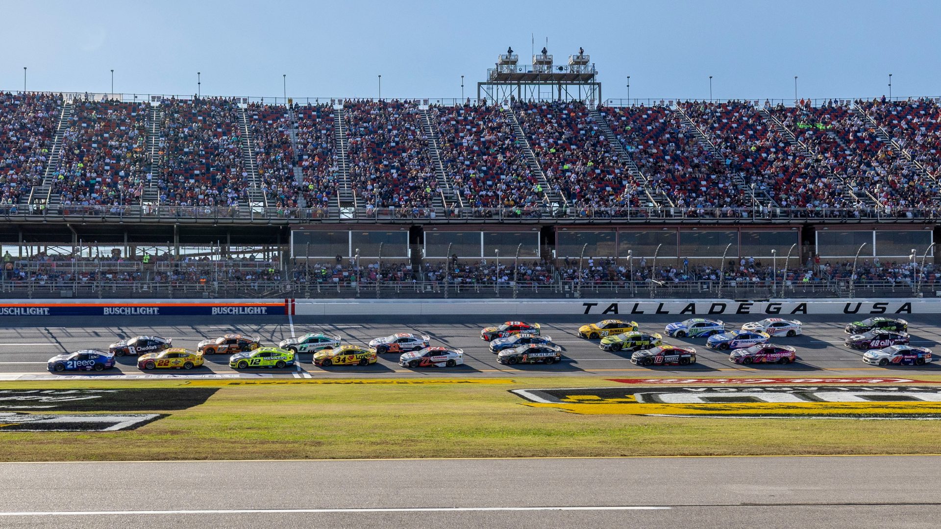NASCAR Cup Series driver Josh Berry (21) leads a large group during stage two of the YellaWood 500 at Talladega Superspeedway.