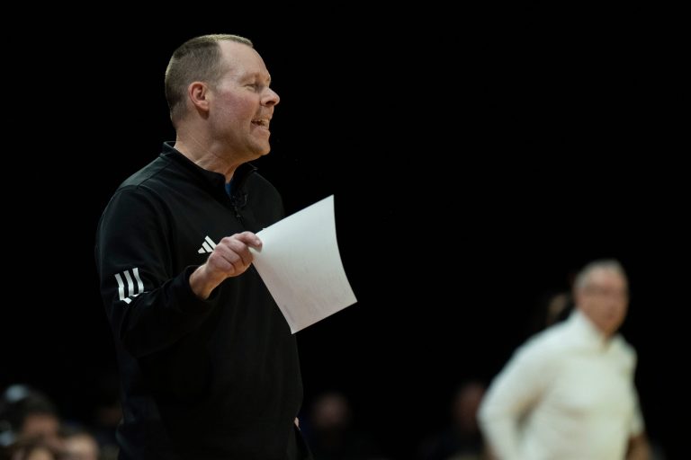 Miami RedHawks head coach Travis Steele coaches in the first half of the NCAA basketball game at Millett Hall in Oxford, Ohio, on Friday, Feb. 13, 2026.