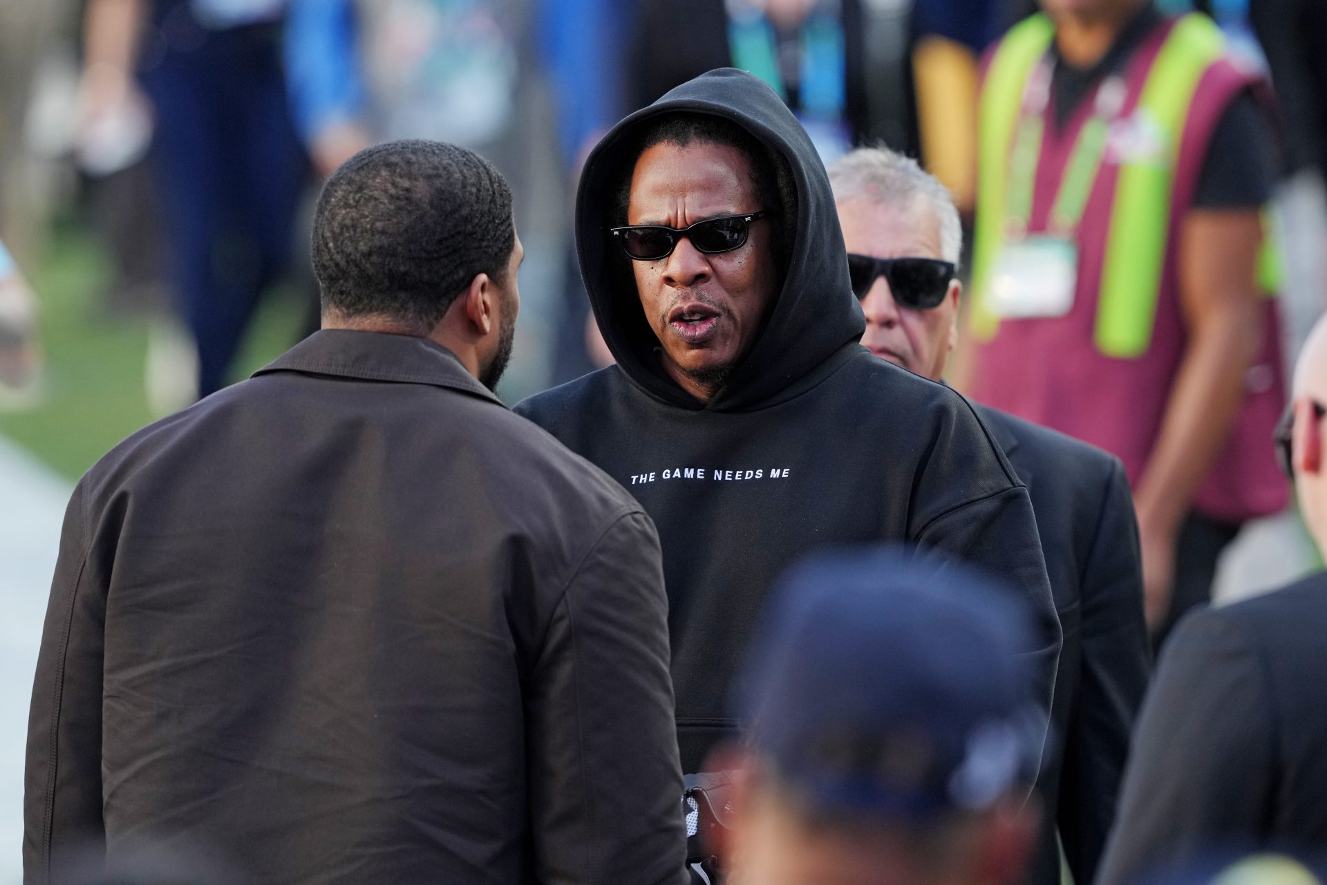 Jay Z and his daughter Blue Ivy arrive before the game between New England Patriots and Seattle Seahawks in Super Bowl LX at Levi's Stadium.