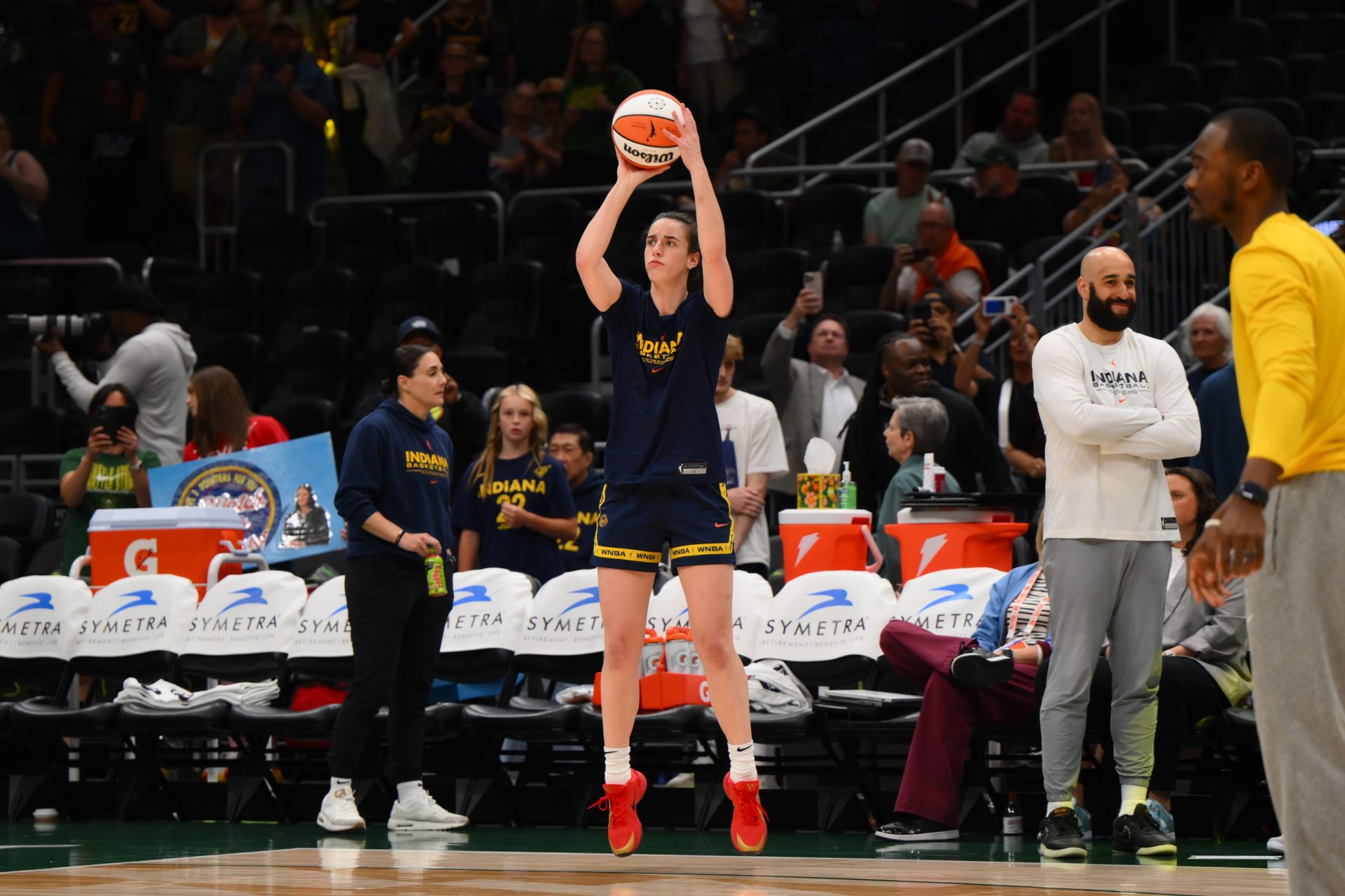 Indiana Fever guard Caitlin Clark (22) shoots the ball during warmups before the game against the Seattle Storm at Climate Pledge Arena.