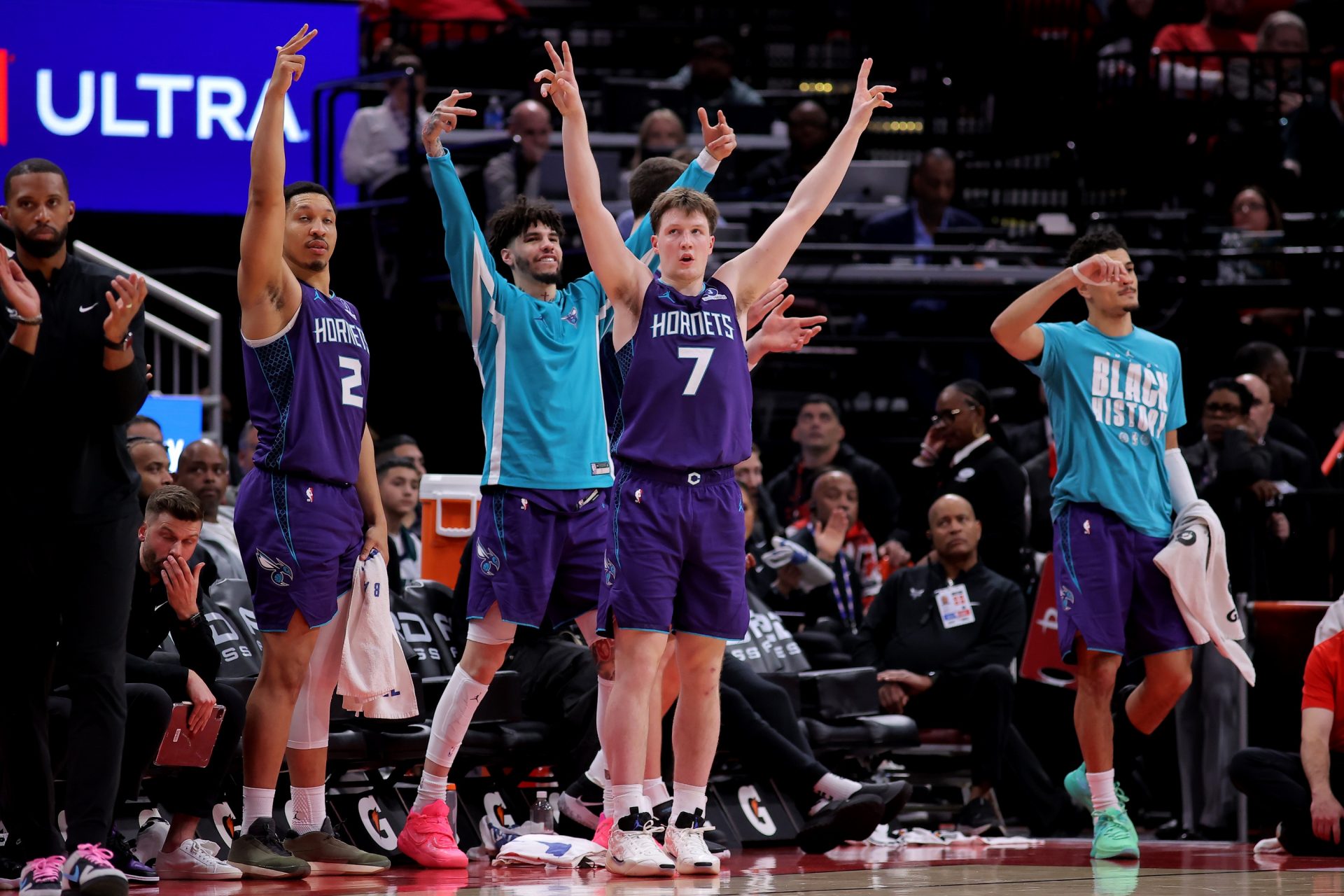 Charlotte Hornets players react after a basket against the Houston Rockets during the fourth quarter at Toyota Center.