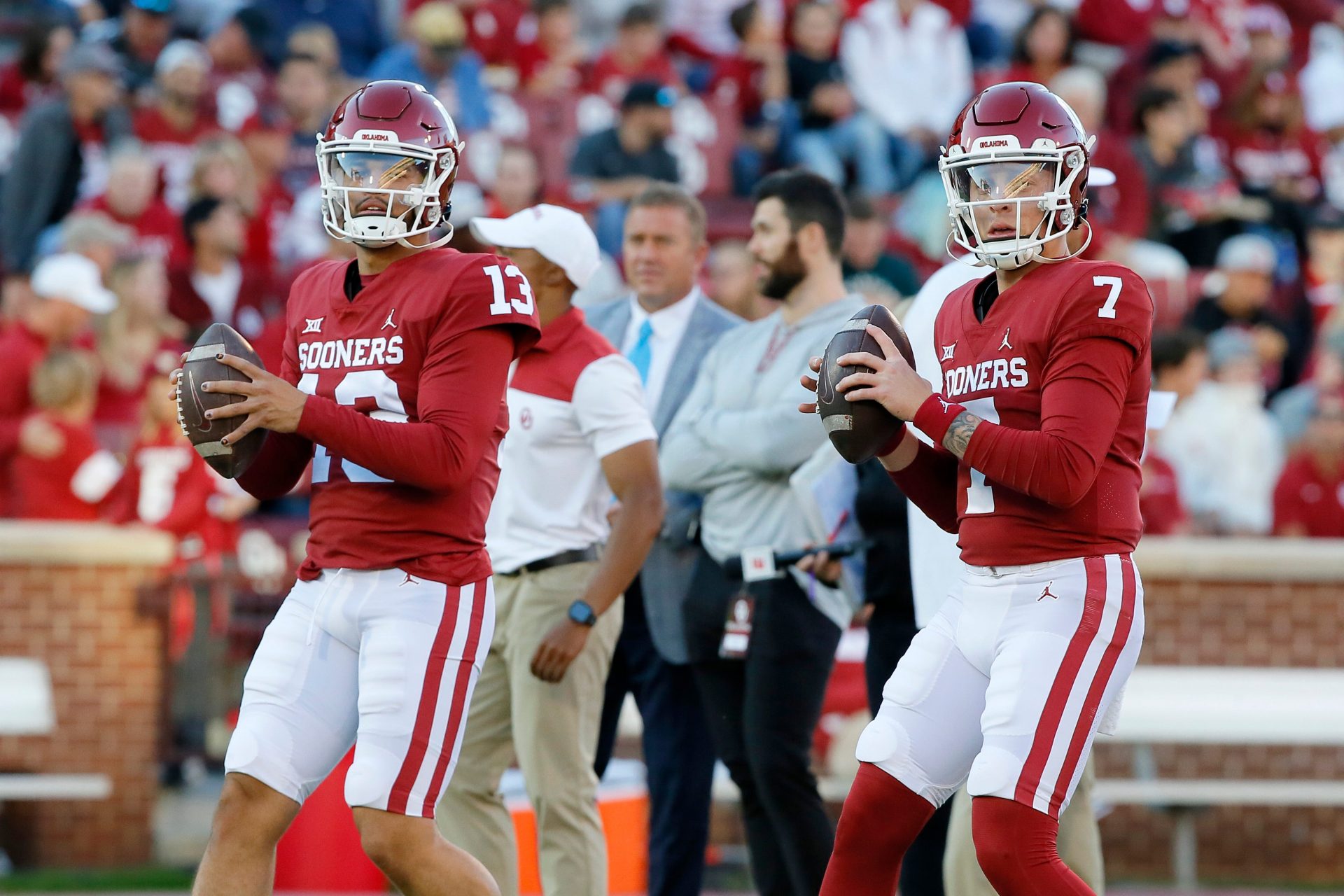 OU quarterbacks Caleb Williams (13) and Spencer Rattler (7) warm up before the TCU game on Oct. 16 in Norman.

WEB ONLY -- williams & rattler