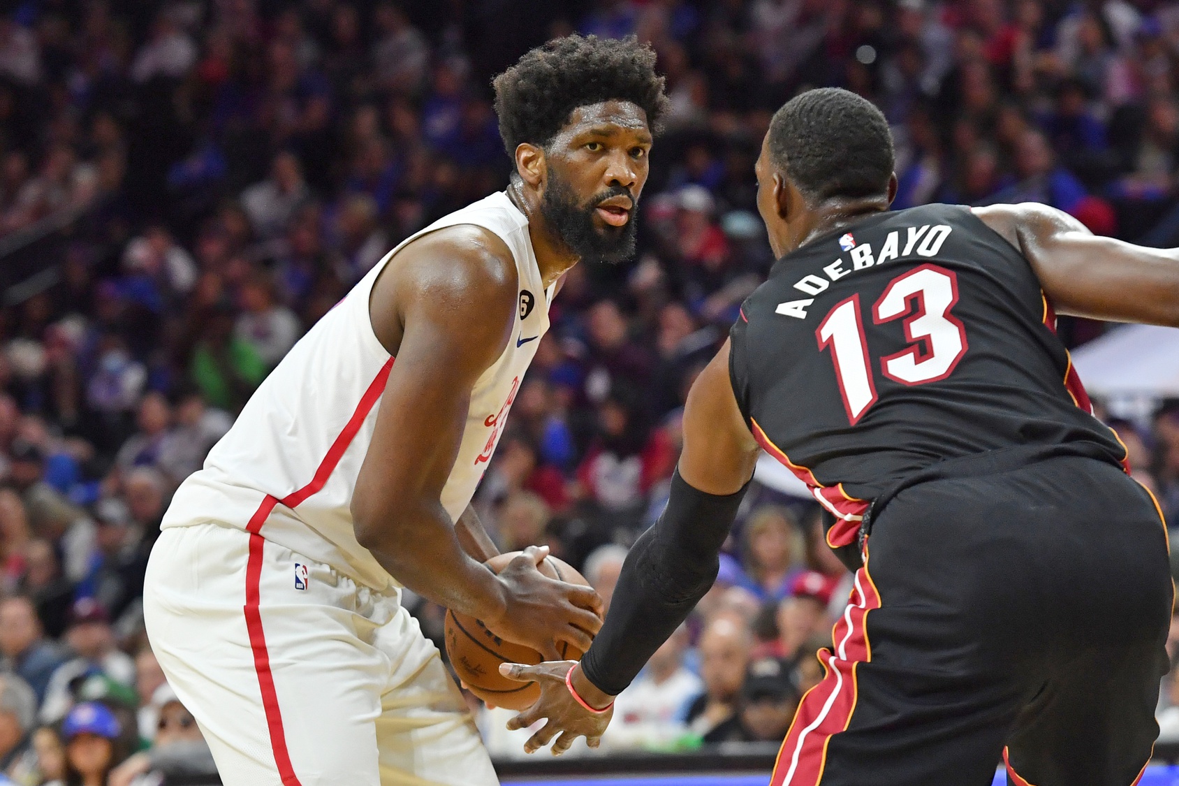 Philadelphia 76ers center Joel Embiid (21) against Miami Heat center Bam Adebayo (13) during the third quarter at Wells Fargo Center. - Source: USA Today Network