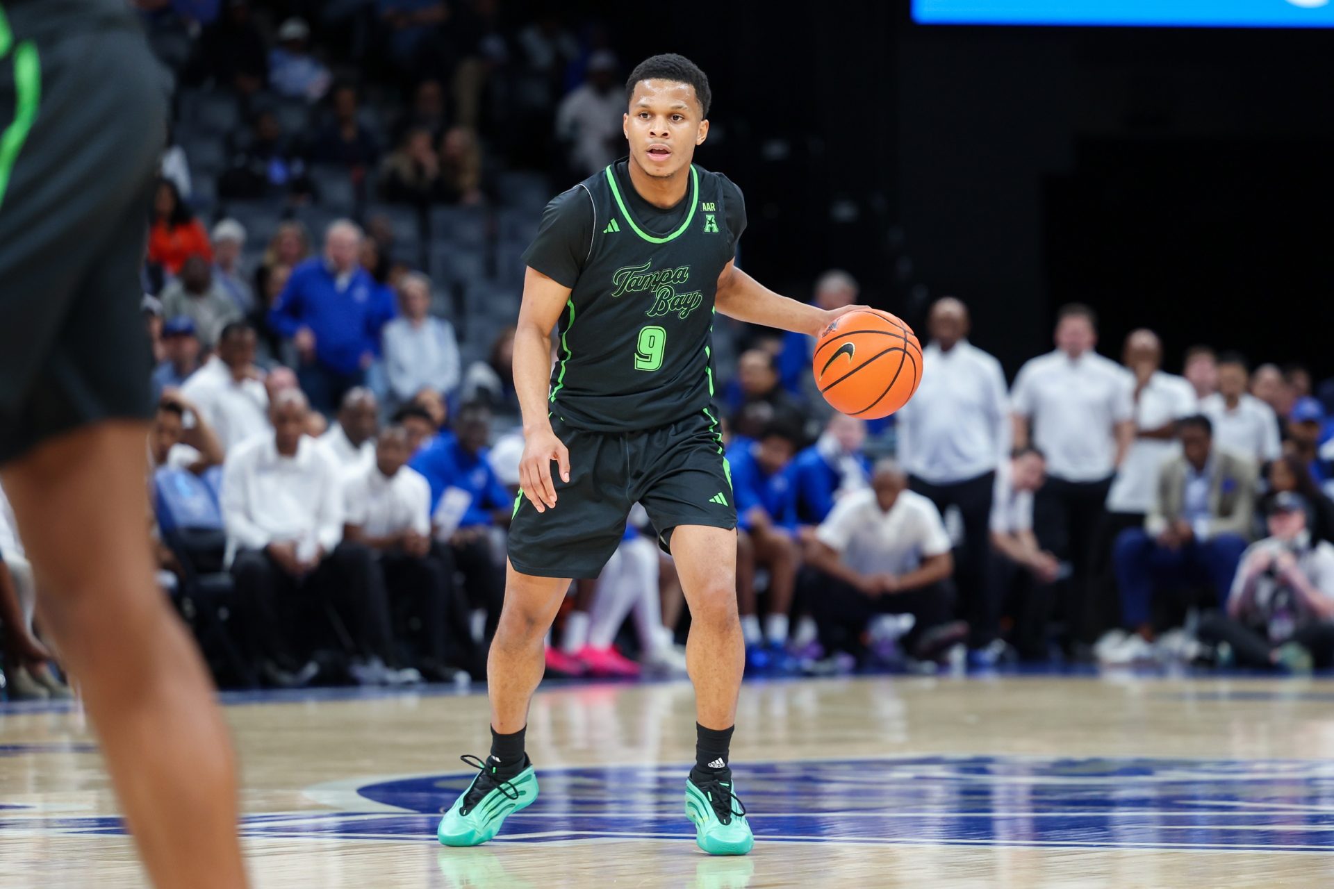 South Florida Bulls guard Gavin Hightower (9) handles the ball against the Memphis Tigers during the second half at FedExForum - Source: Imagn