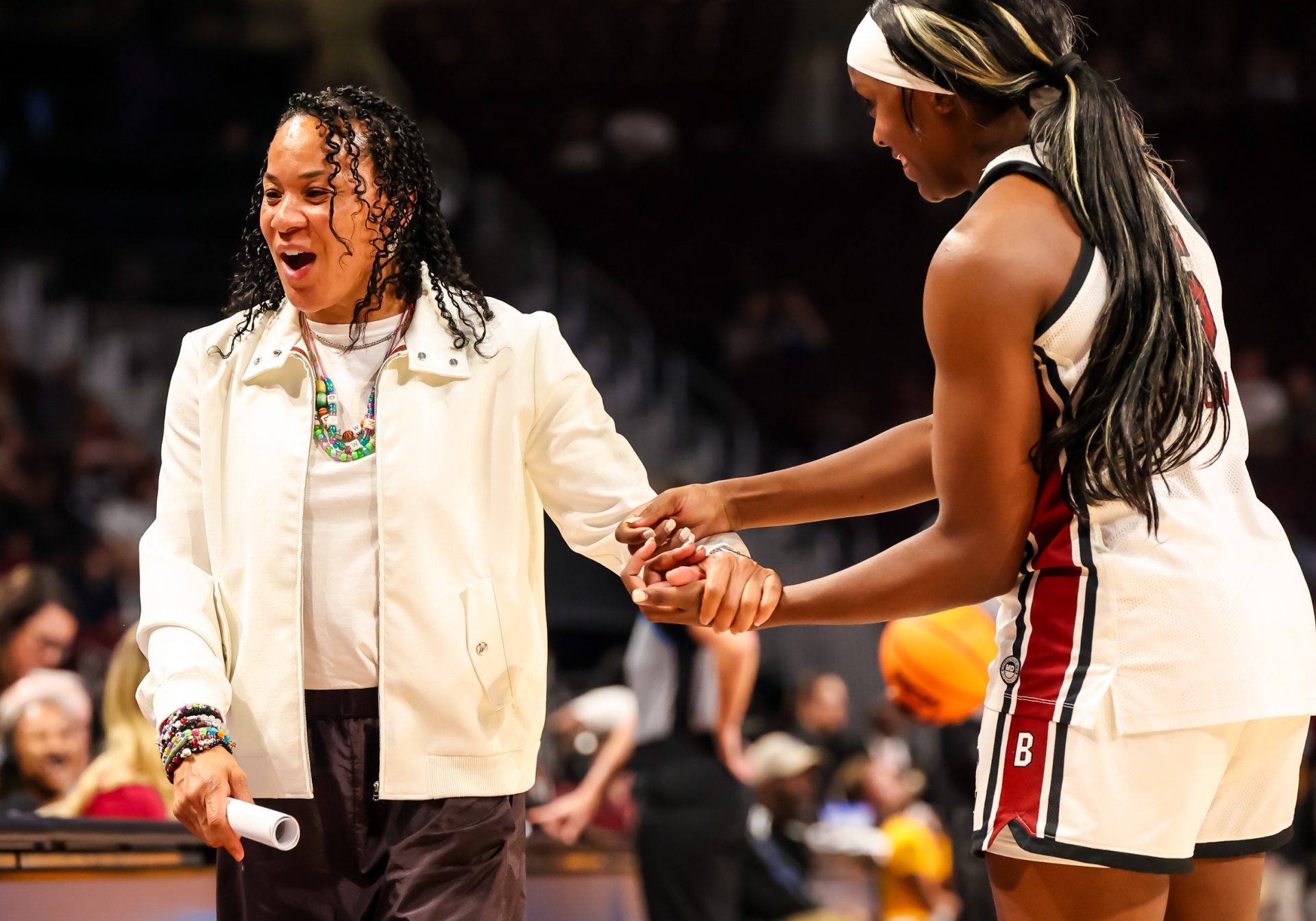 Dawn Staley with Raven Johnson during game vs. Winthrop -
Source: Imagn