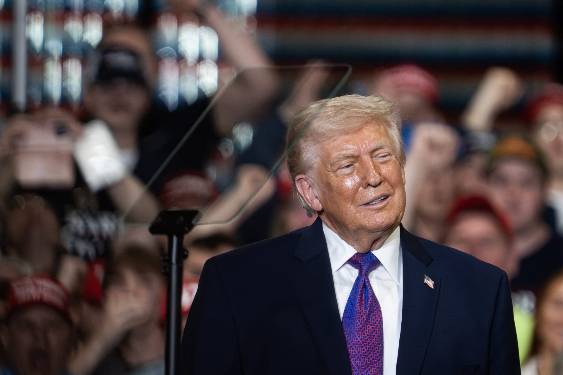U.S. President Donald Trump listens as Ed Gallrein speaks during an event at Verst Logistics on March 11, 2026, in Hebron, Ky. - Source: Imagn