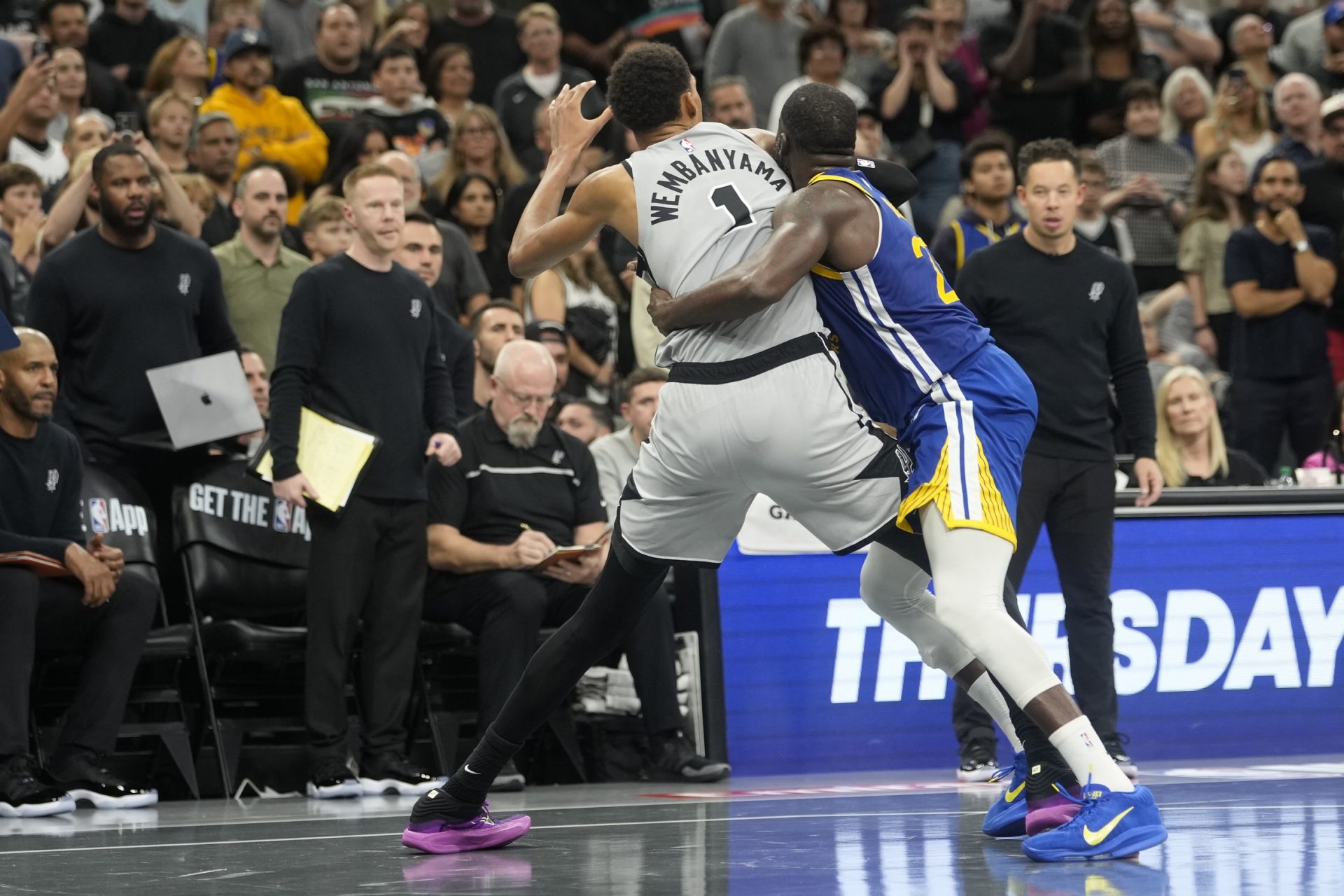 San Antonio Spurs forward Victor Wembanyama (1) waits for an inbound pass while defended by Golden State Warriors forward Draymond Green (23) during the second half at Frost Bank Center - Source: Imagn Images