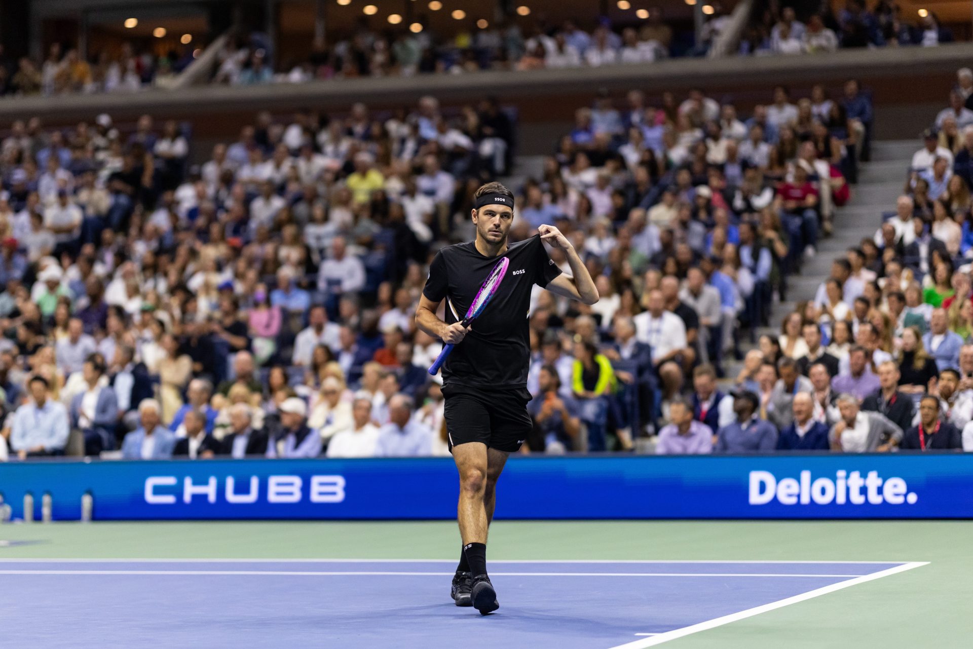 Taylor Fritz of the United States in action against Novak Djokovic of Serbia in the quarterfinal of the men’s singles at the US Open at Arthur Ashe Stadium in Billie Jean King National Tennis Center.