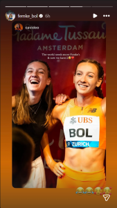 Femke Bol posing alongside her statue (Image via Instagram/@femke_bol).