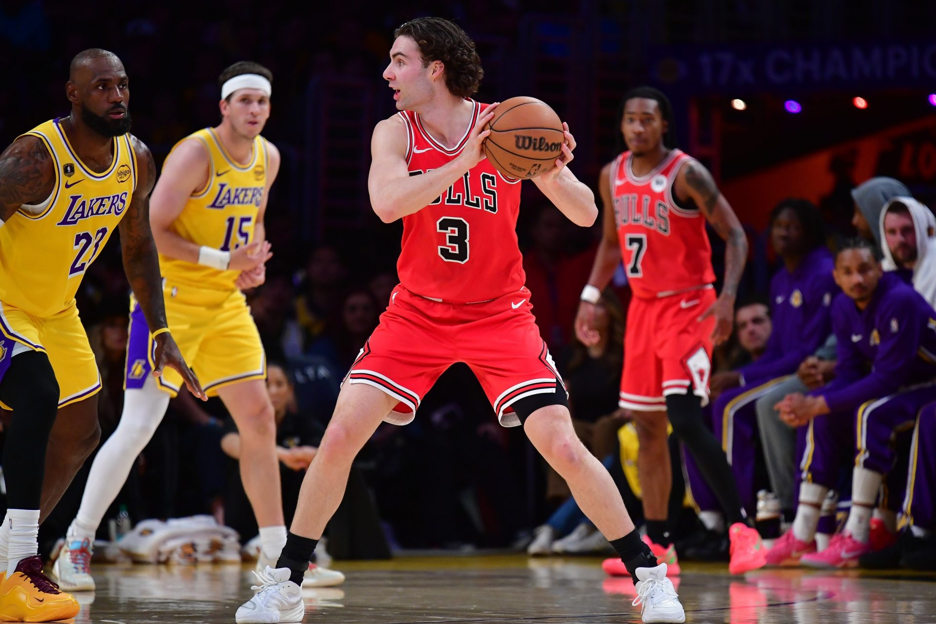 Chicago Bulls guard Josh Giddey (3) controls the ball against Los Angeles Lakers forward LeBron James (23) during the first half at Crypto.com Arena - Source: Imagn Images