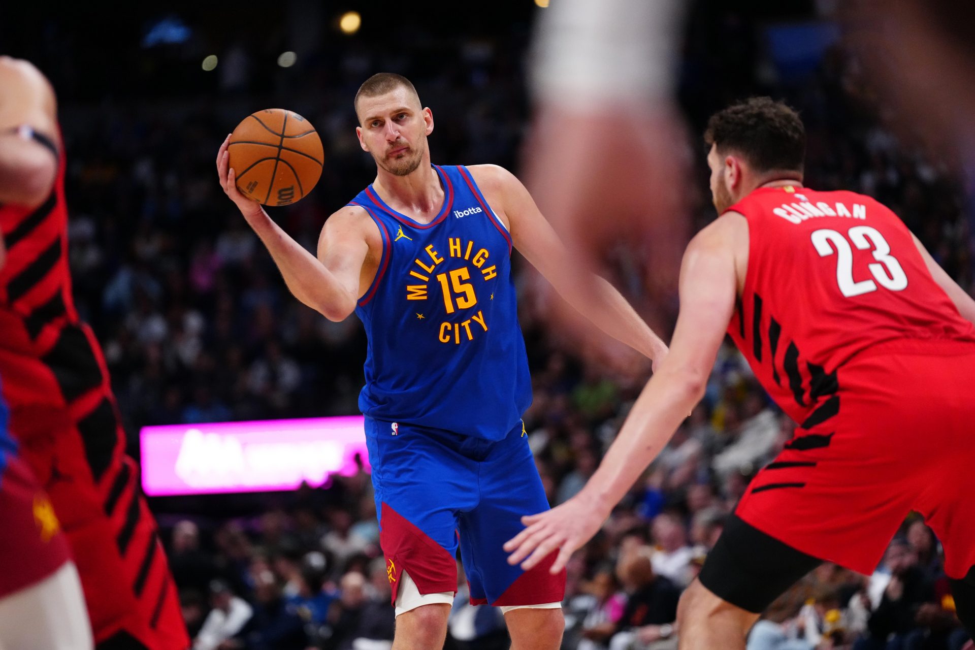 Denver Nuggets center Nikola Jokic (15) prepares to pass the ball in the second quarter against the Portland Trail Blazers at Ball Arena. - Source: Imagn