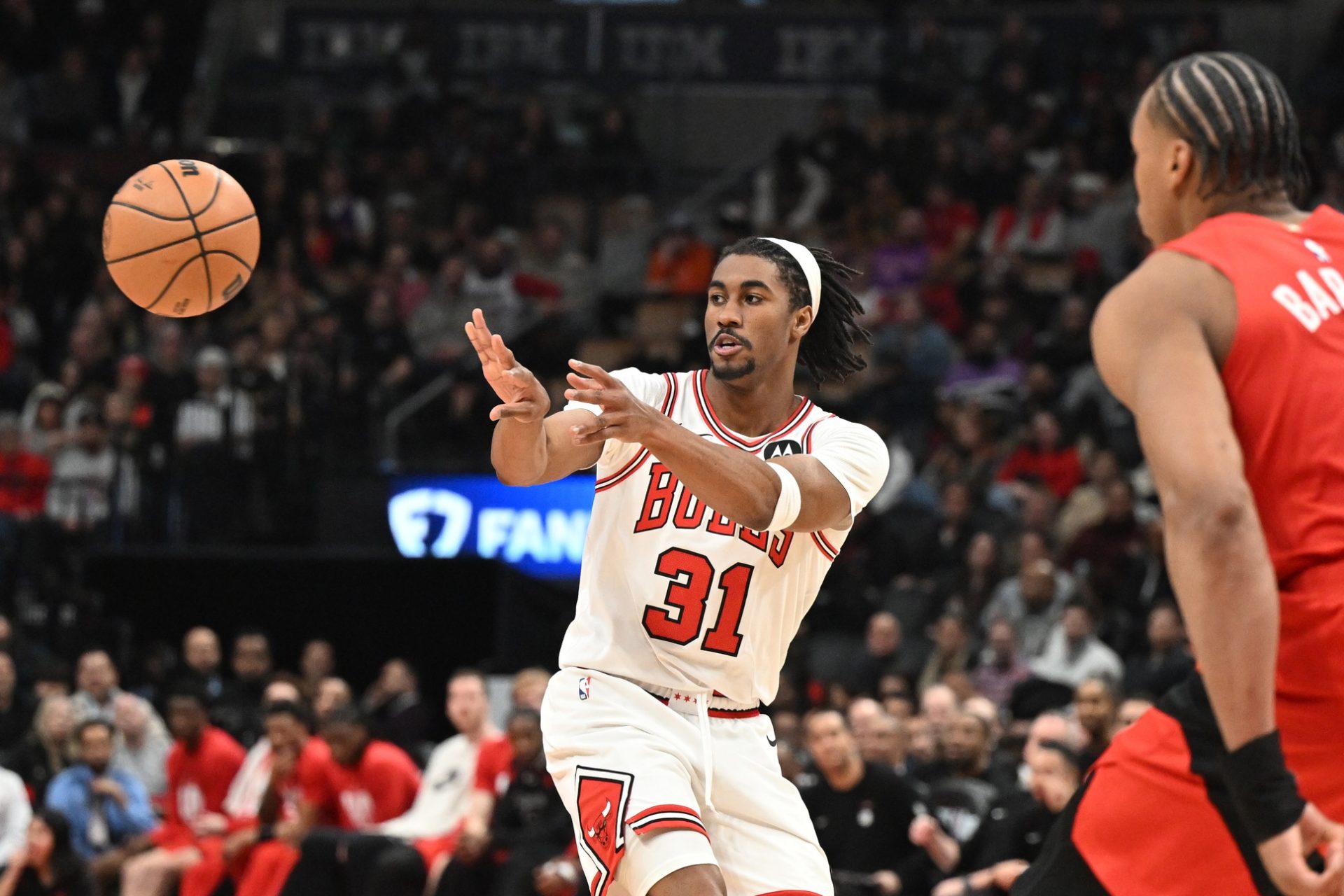 Chicago Bulls guard Jaden Ivey (31) passes against the Toronto Raptors in the second half at Scotiabank Arena. - Source: Imagn