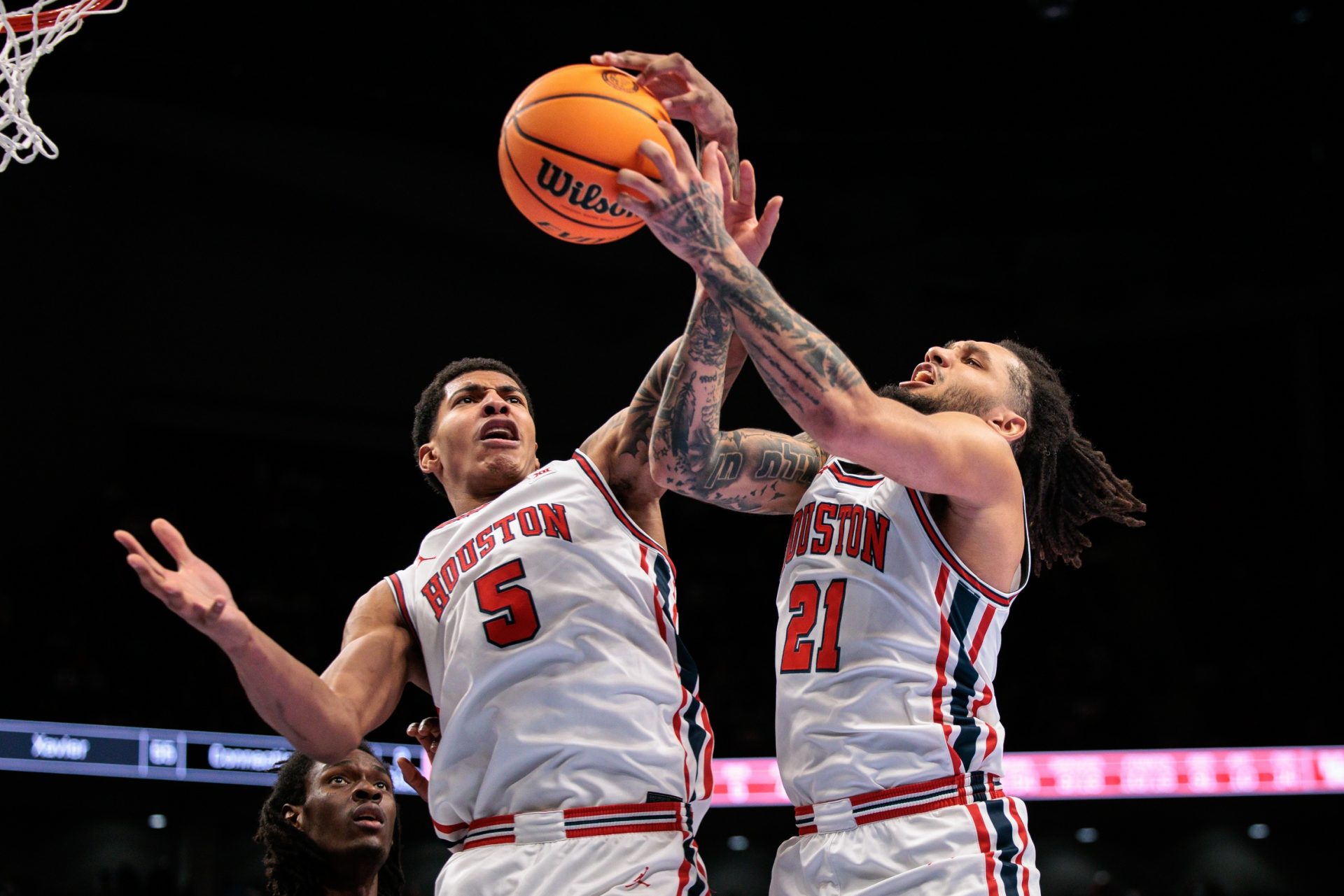 Houston's Chris Cenac Jr. and Emanuel Sharp vs. BYU 
Source: Imagn
