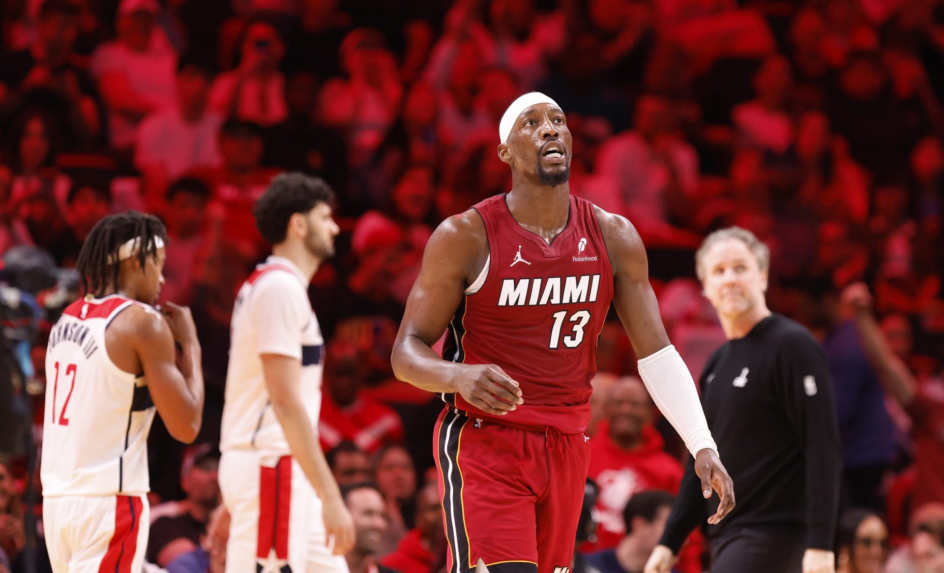 Miami Heat center Bam Adebayo (13) walks back to the bench during a time out against the Washington Wizards during the second half at Kaseya Center - Source: Imagn Images