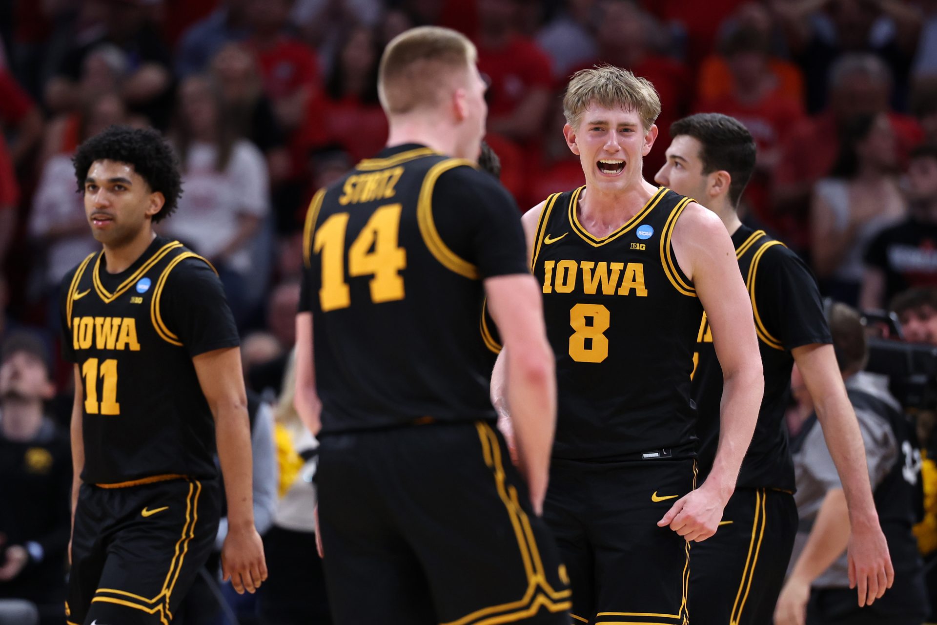 Iowa Hawkeyes forward Cooper Koch (8) reacts in the second half during a Sweet Sixteen game of the South Regional of the men's 2026 NCAA Tournament at Toyota Center - Source: Imagn