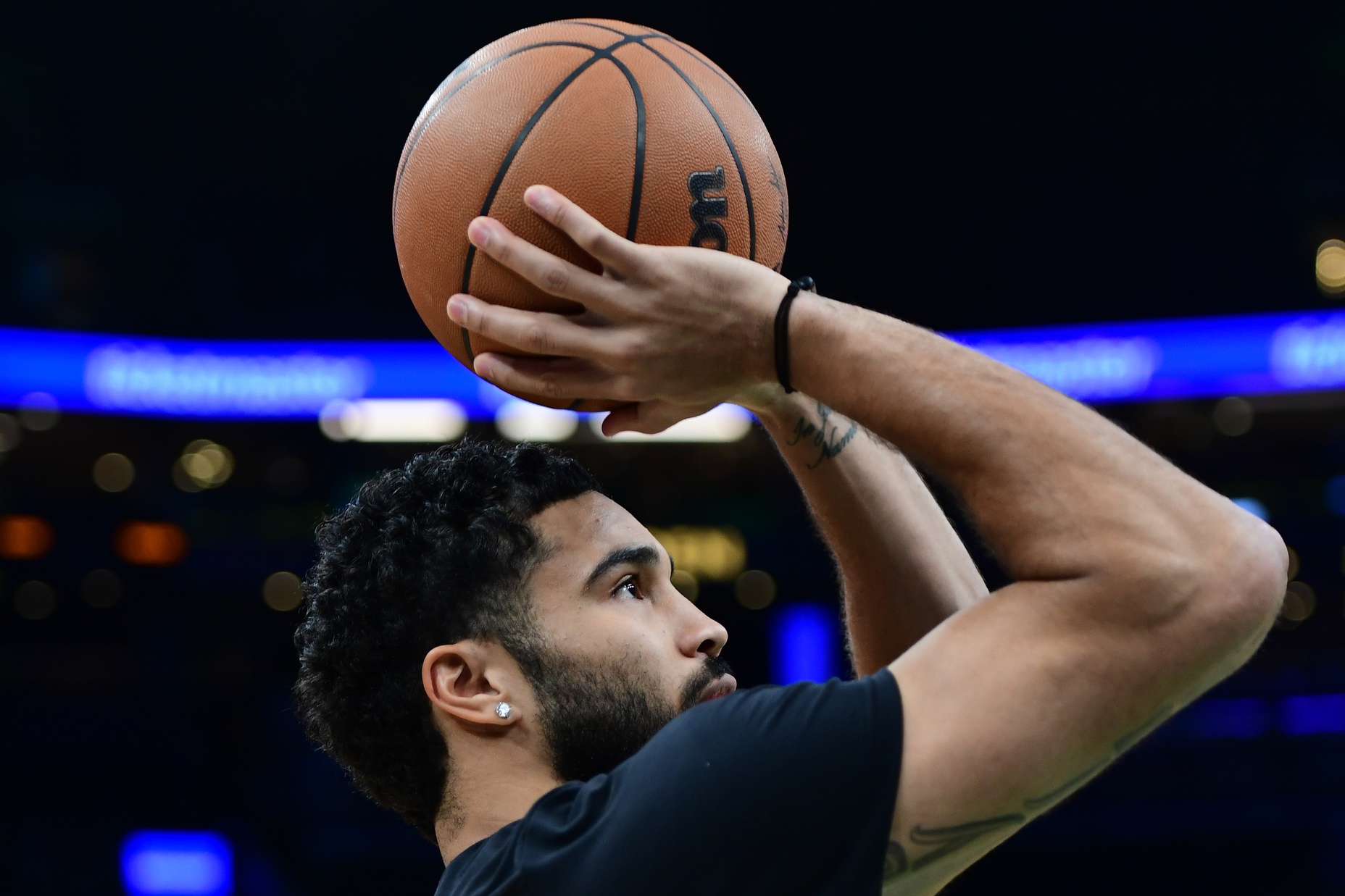 Boston Celtics forward Jayson Tatum (0) shoots the ball during warmups prior to a game against the Minnesota Timberwolves at TD Garden. - Source: Imagn