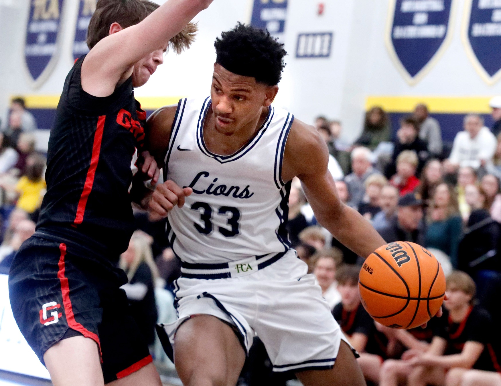 PCA's Chris Washington Jr. (33) drives to the basket as Grace Christian Academy's Jude Mayfield (4) guards him during the boys' basketball game on Friday, Feb. 6, 2026 - Source: Imagn