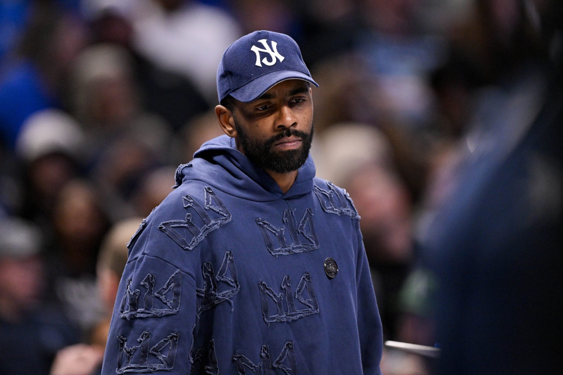 Dallas Mavericks guard Kyrie Irving (11) looks on during the second half against the Memphis Grizzlies at the American Airlines Center. - Source: Imagn