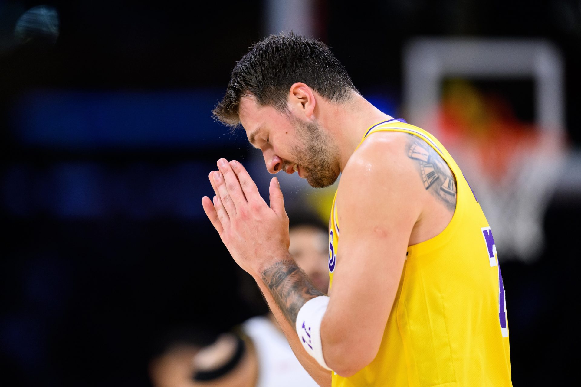 Los Angeles Lakers guard Luka Doncic (77) reacts after missing a shot during the first half against the Denver Nuggets at Crypto.com Arena - Source: Imagn Images