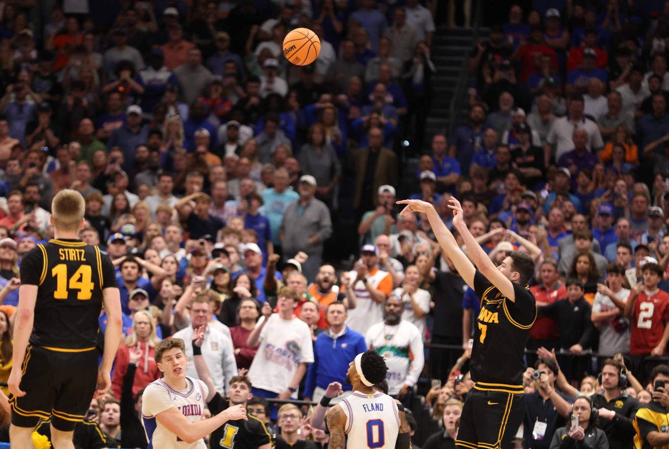 Iowa forward Alvaro Folgueiras (7) shoots the game winning three point shot in the final seconds during the second half of the NCAA March Madness second round at Benchmark international Arena in Tampa, FL -
Source: Imagn