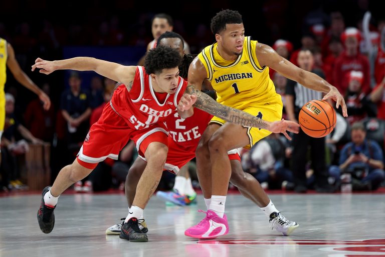 Ohio State Buckeyes guard John Mobley Jr. tries to steal the ball from Michigan Wolverines guard Trey McKenney
Source: Imagn