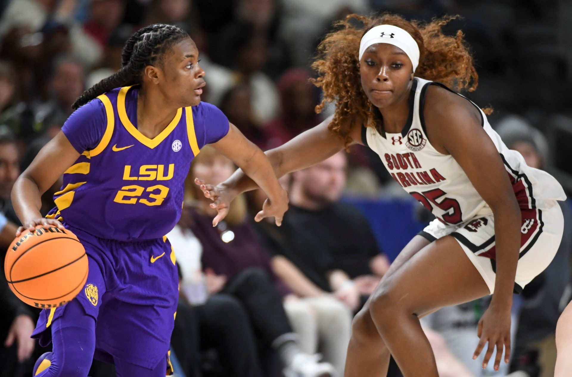 Louisiana State Tigers guard Milaysia Fulwiley (23) is defended by South Carolina Gamecocks guard Raven Johnson 
Source: Imagn