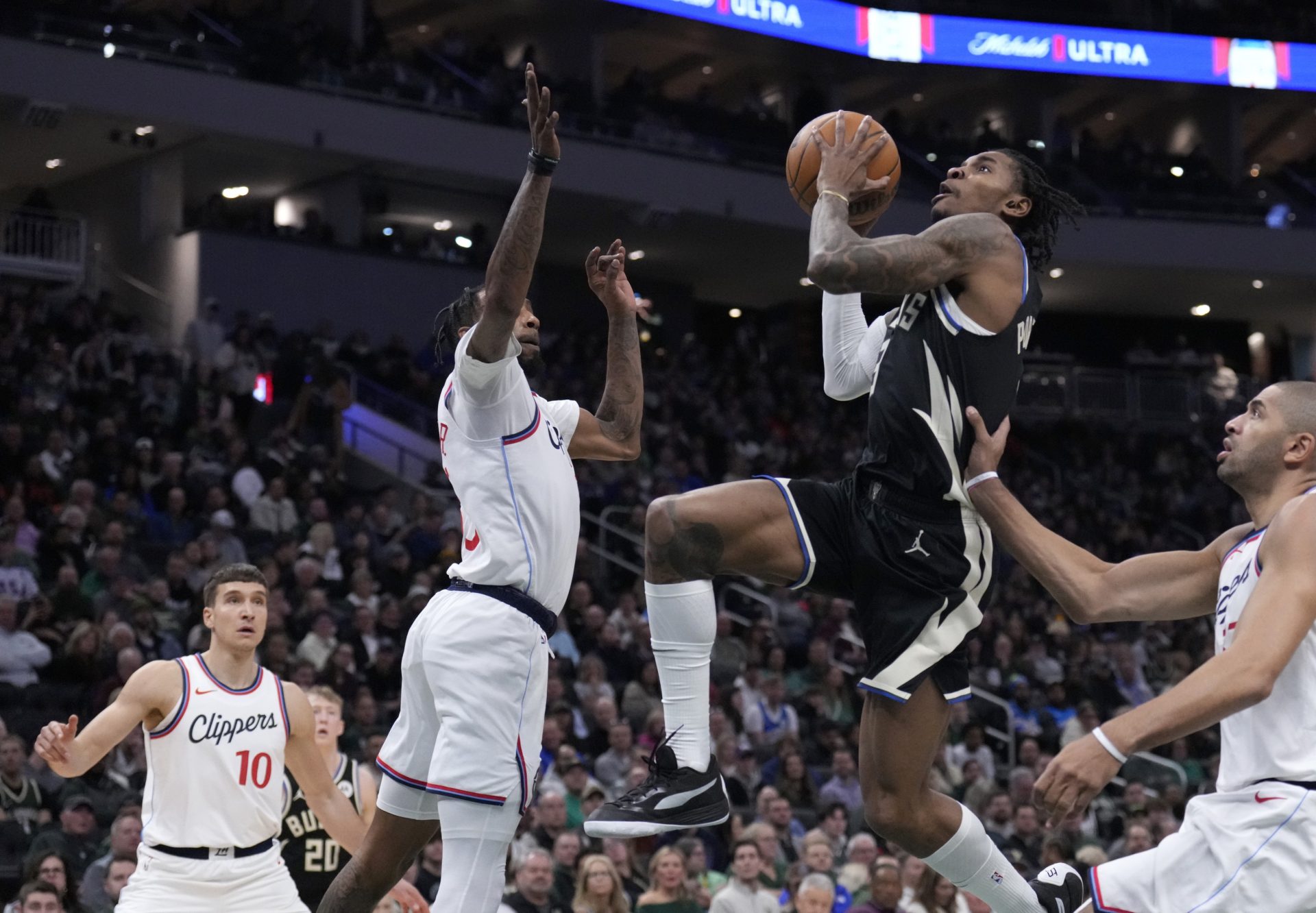 Milwaukee Bucks vs LA Clippers Prediction, Injury Reports and More (March 23) - 2025-26 NBA Season - Source: Imagn