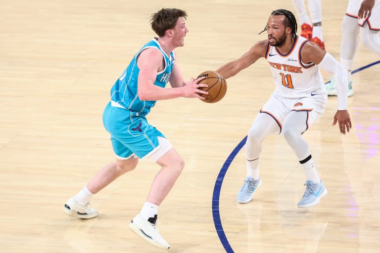 Charlotte Hornets guard Kon Knueppel (7) looks to drive past New York Knicks guard Jalen Brunson (11) in the first quarter at Madison Square Garden.