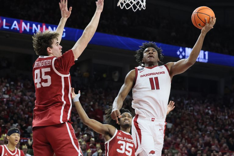 Arkansas Razorbacks forward Karter Knox (11) shoots in the second half as Oklahoma Sooners forward Luke Northweather (45) defends at Bud Walton Arena. Source: Nelson Chenault-Imagn Images