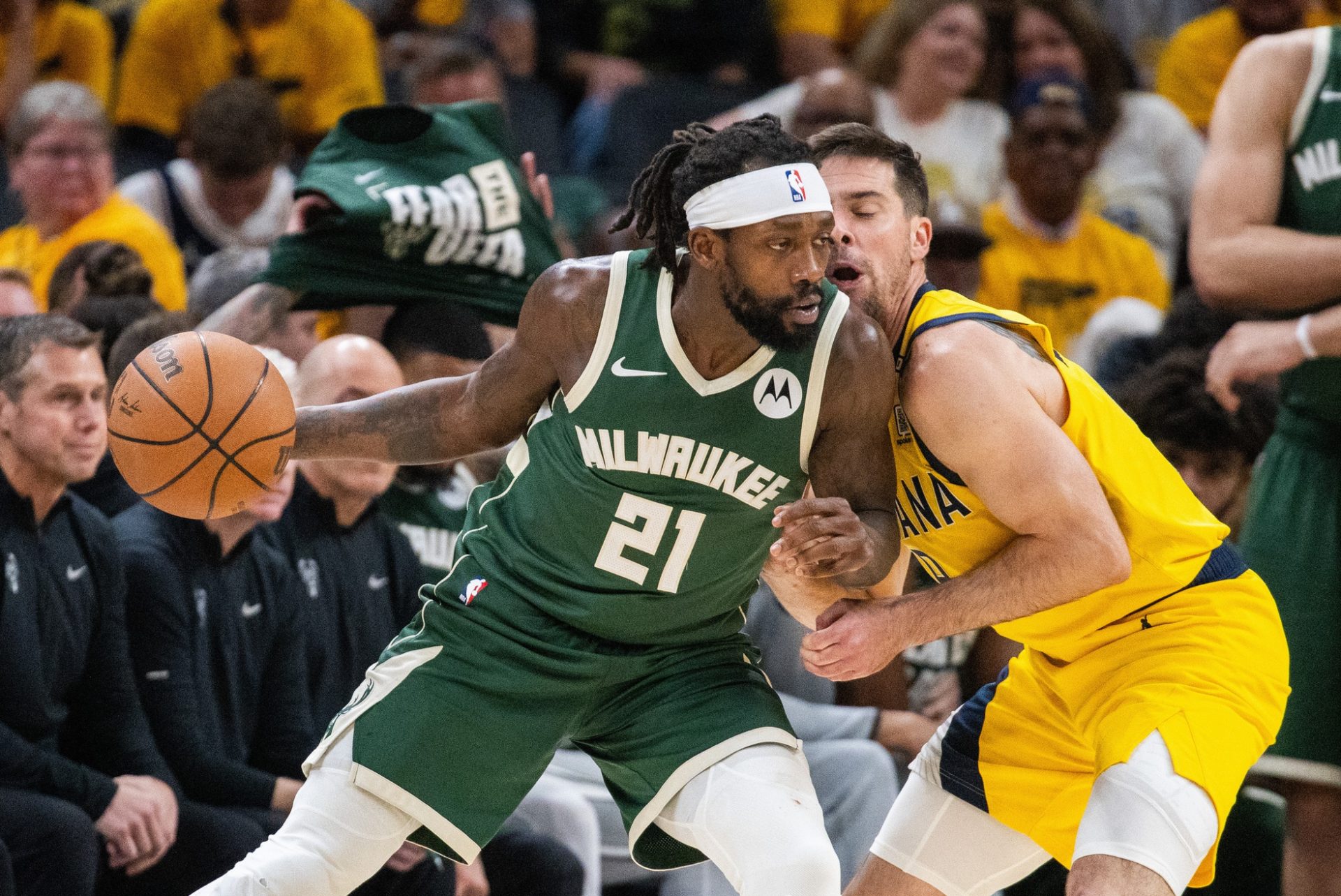 Milwaukee Bucks guard Patrick Beverley (21) dribbles the ball while Indiana Pacers guard T.J. McConnell (9) defends during game six of the first round for the 2024 NBA playoffs at Gainbridge Fieldhouse - Source: USA TODAY Sports