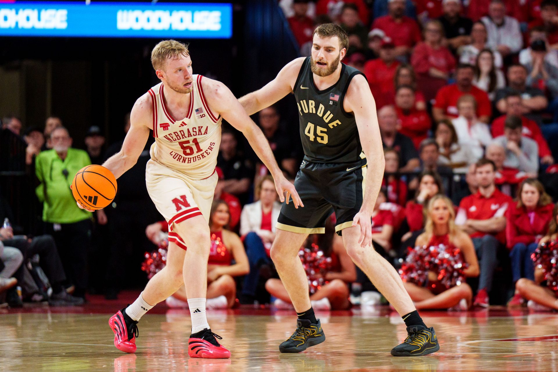 Nebraska Cornhuskers forward Rienk Mast (51) looks to pass against Purdue Boilermakers center Oscar Cluff (45) during the second half at Pinnacle Bank Arena. Source: Dylan Widger-Imagn Images