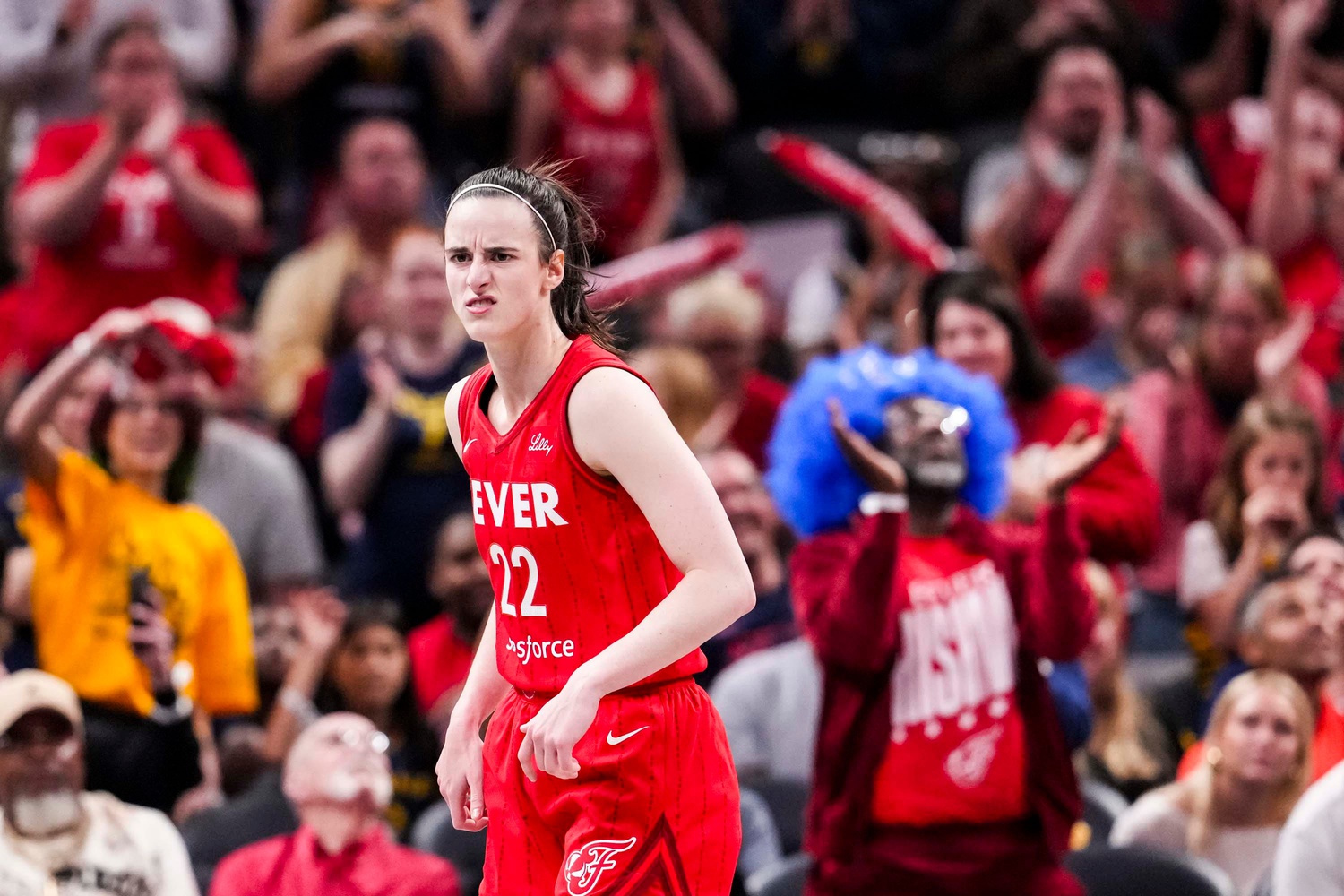 Indiana Fever guard Caitlin Clark reacts to scoring a 3-pointer Saturday, May 17, 2025, during a game against the Chicago Sky at Gainbridge Fieldhouse in Indianapolis - Source: Imagn