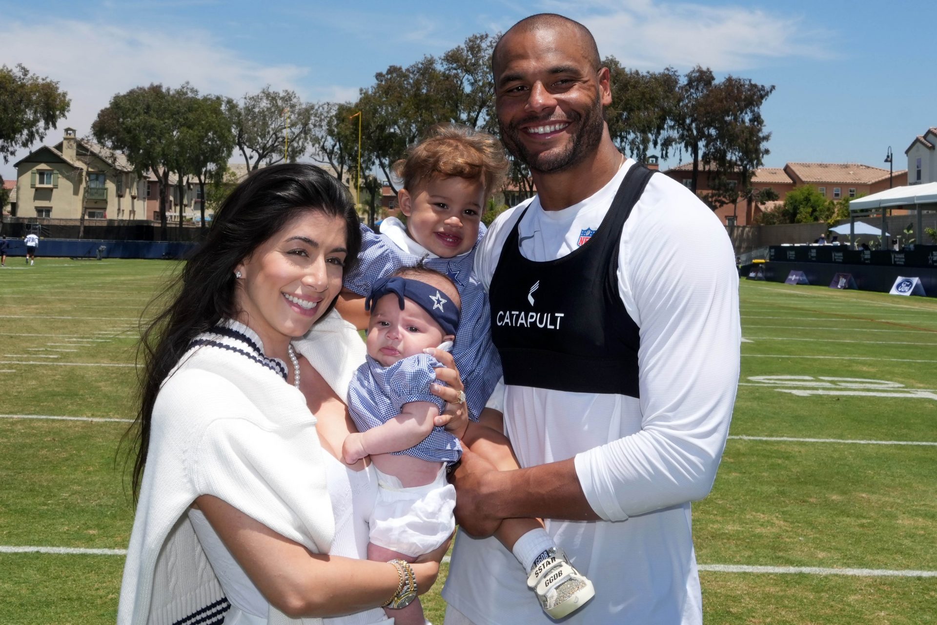 Dallas Cowboys quarterback Dak Prescott poses with fiancee Sarah Jane Ramos and daughters MJ Rose Prescott and Aurora Prescott - Dallas Cowboys training camp - Source: Imagn