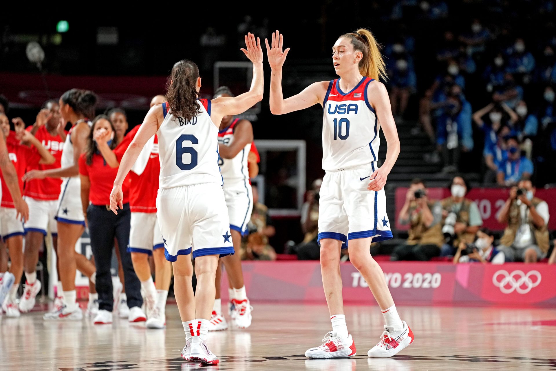 Sue Bird (6) and United States forward Breanna Stewart (10) celebrate against Japan in the women's basketball gold medal match during the Tokyo 2020 Olympic Summer Games at Saitama Super Arena - Source: USA TODAY Sports