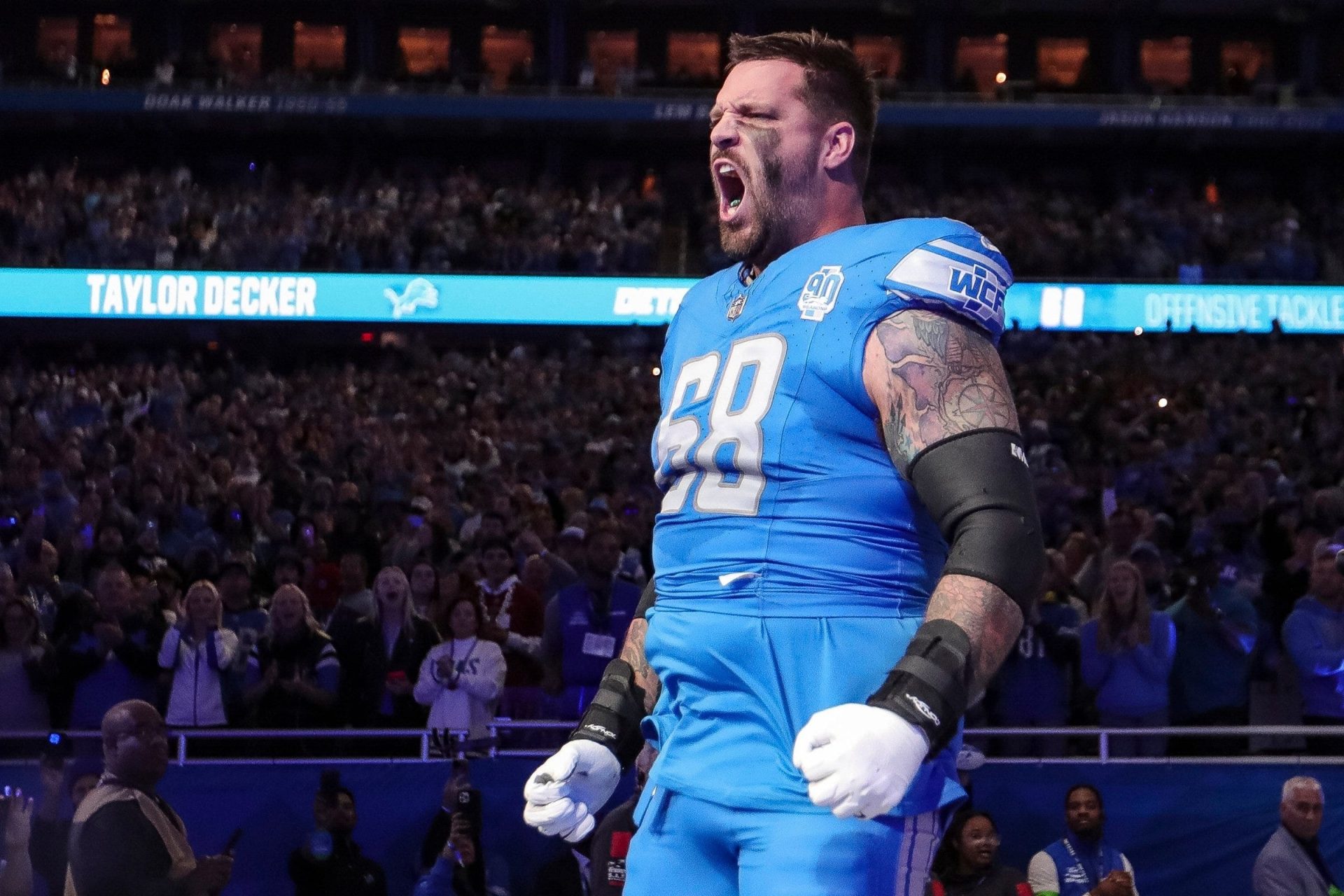 Detroit Lions left tackle Taylor Decker takes the field during player introductions before the Detroit Lions game against the Carolina Panthers 
Source: Imagn