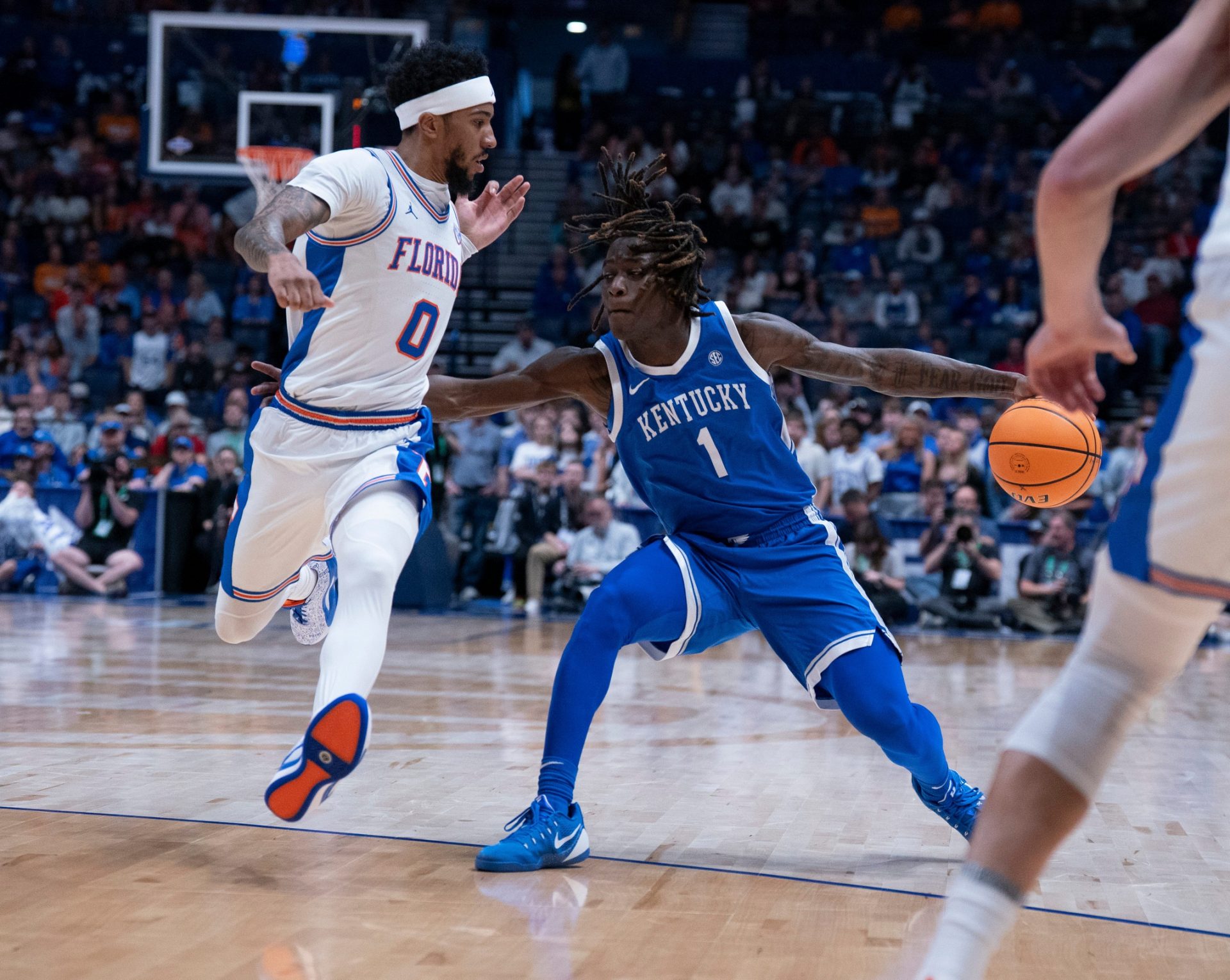 Florida guard Boogie Fland (0) guards Kentucky guard Denzel Aberdeen (1) during their quarterfinal game of the 2026 SEC Men’s Basketball Tournament at Bridgestone Arena 
Source: Imagn