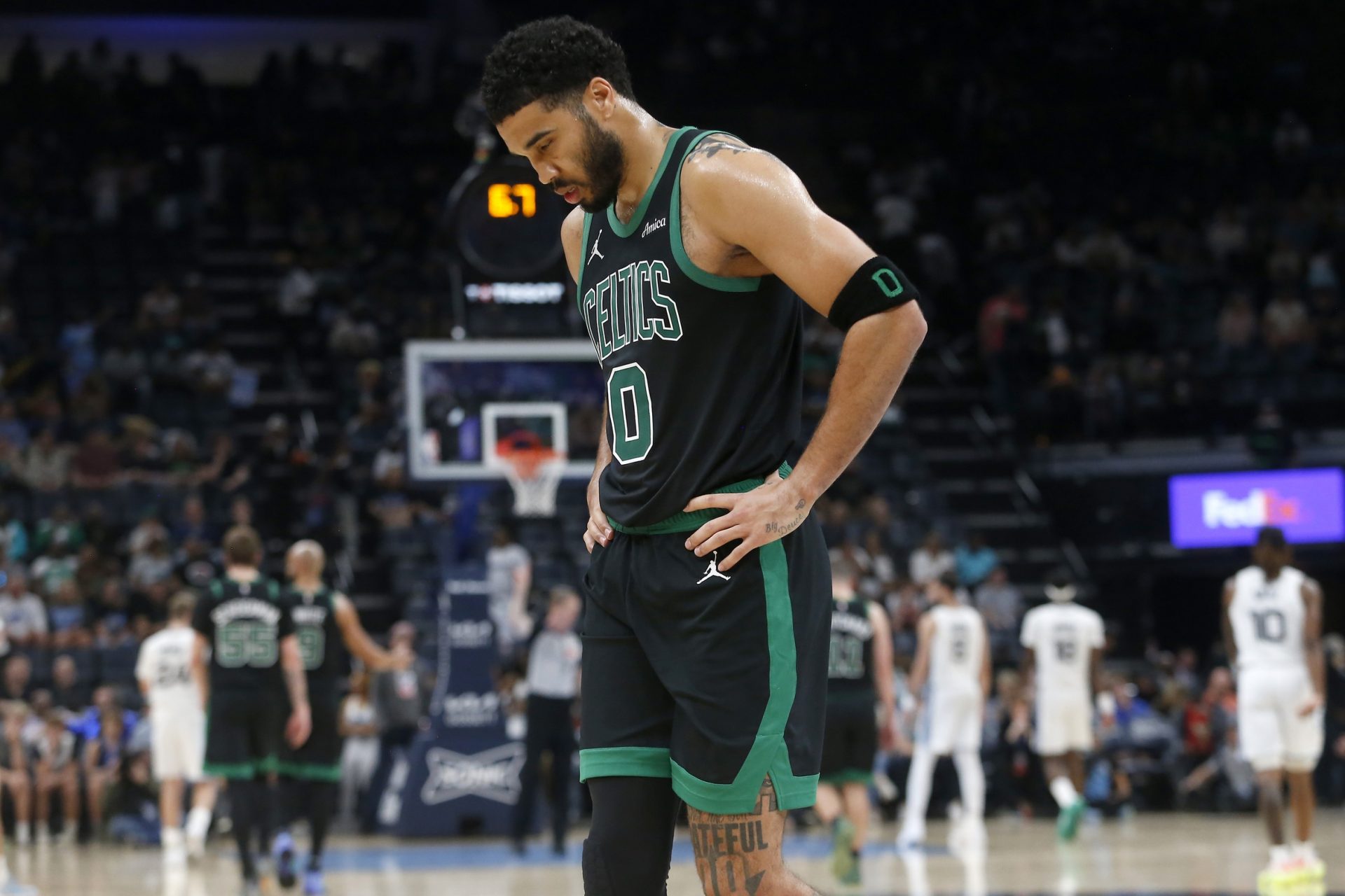 Boston Celtics forward Jayson Tatum (0) walks toward the bench during the fourth quarter against the Memphis Grizzlies at FedExForum - Source: Imagn Images