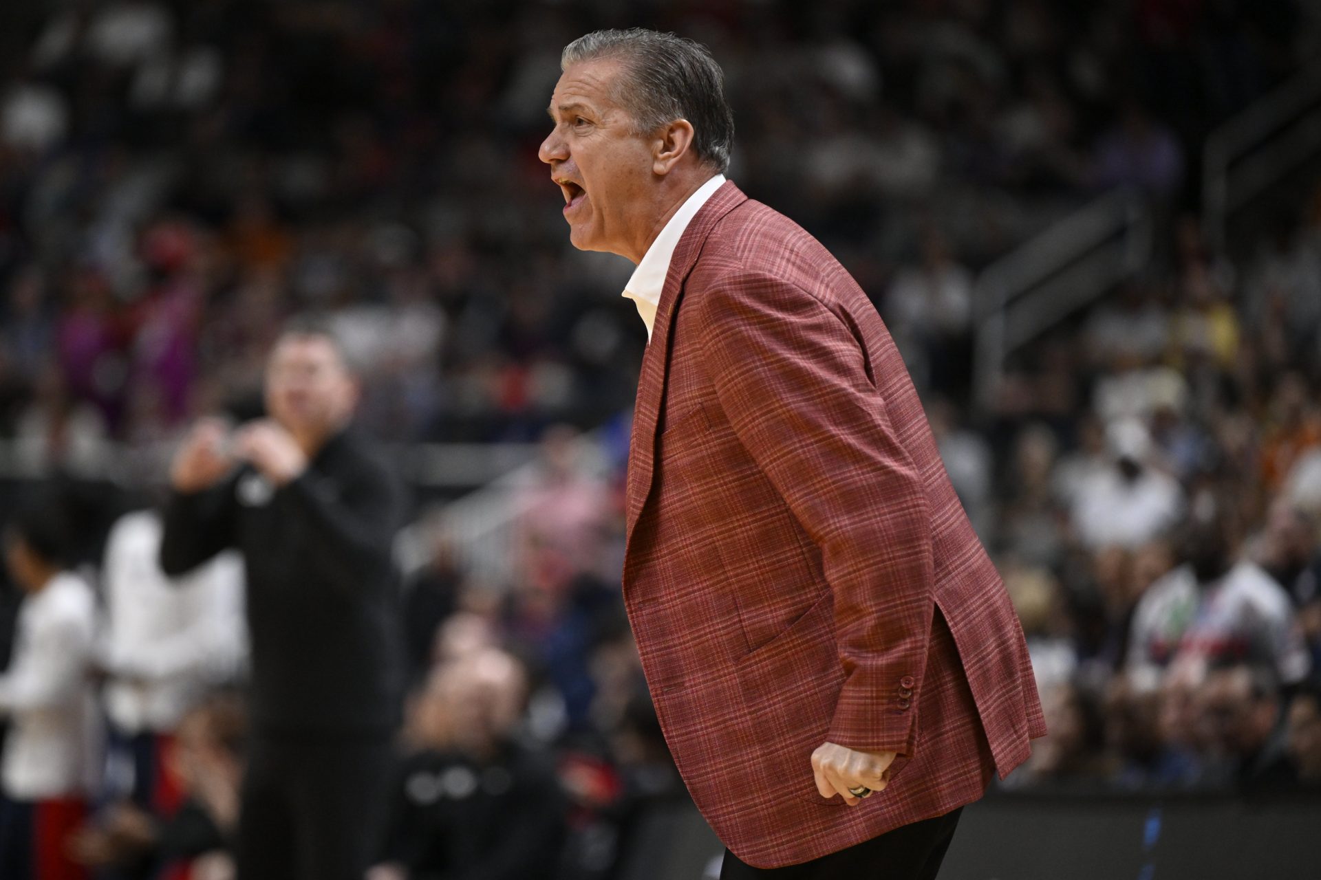 Arkansas Razorbacks head coach John Calipari reacts to a play against the Arizona Wildcats in the first half during a Sweet Sixteen game of the West Regional of the men's 2026 NCAA Tournament at SAP Center. Source: Imagn