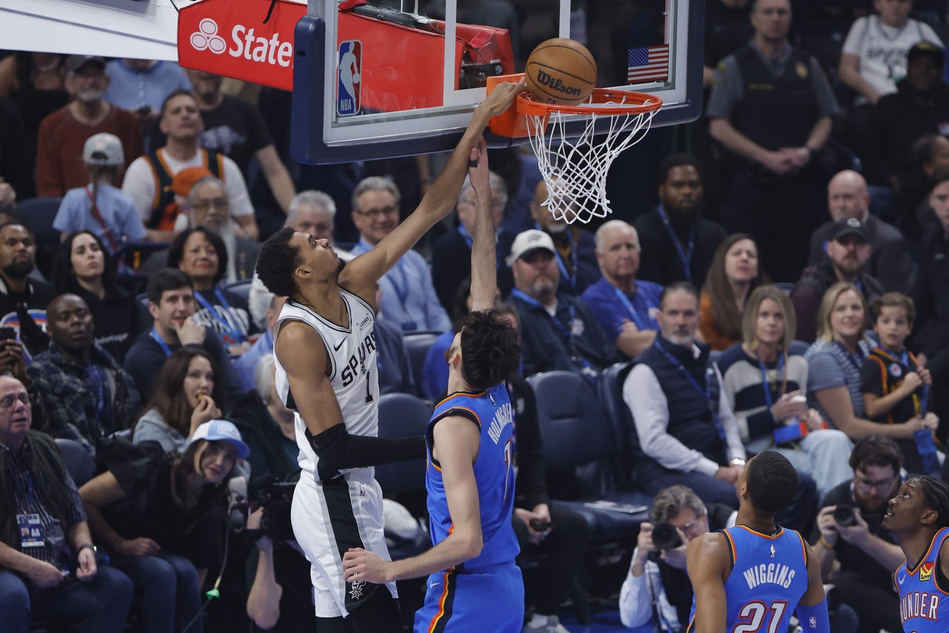 San Antonio Spurs forward/center Victor Wembanyama (1) shoots as Oklahoma City Thunder center/forward Chet Holmgren (7) defends during the first quarter at Paycom Center. - Source: Imagn