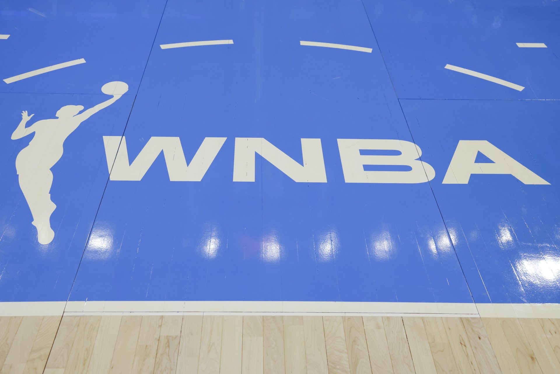 WNBA logo is seen on the court before a basketball game between the Chicago Sky and Minnesota Lynx at Wintrust Arena - Source: Imagn Images